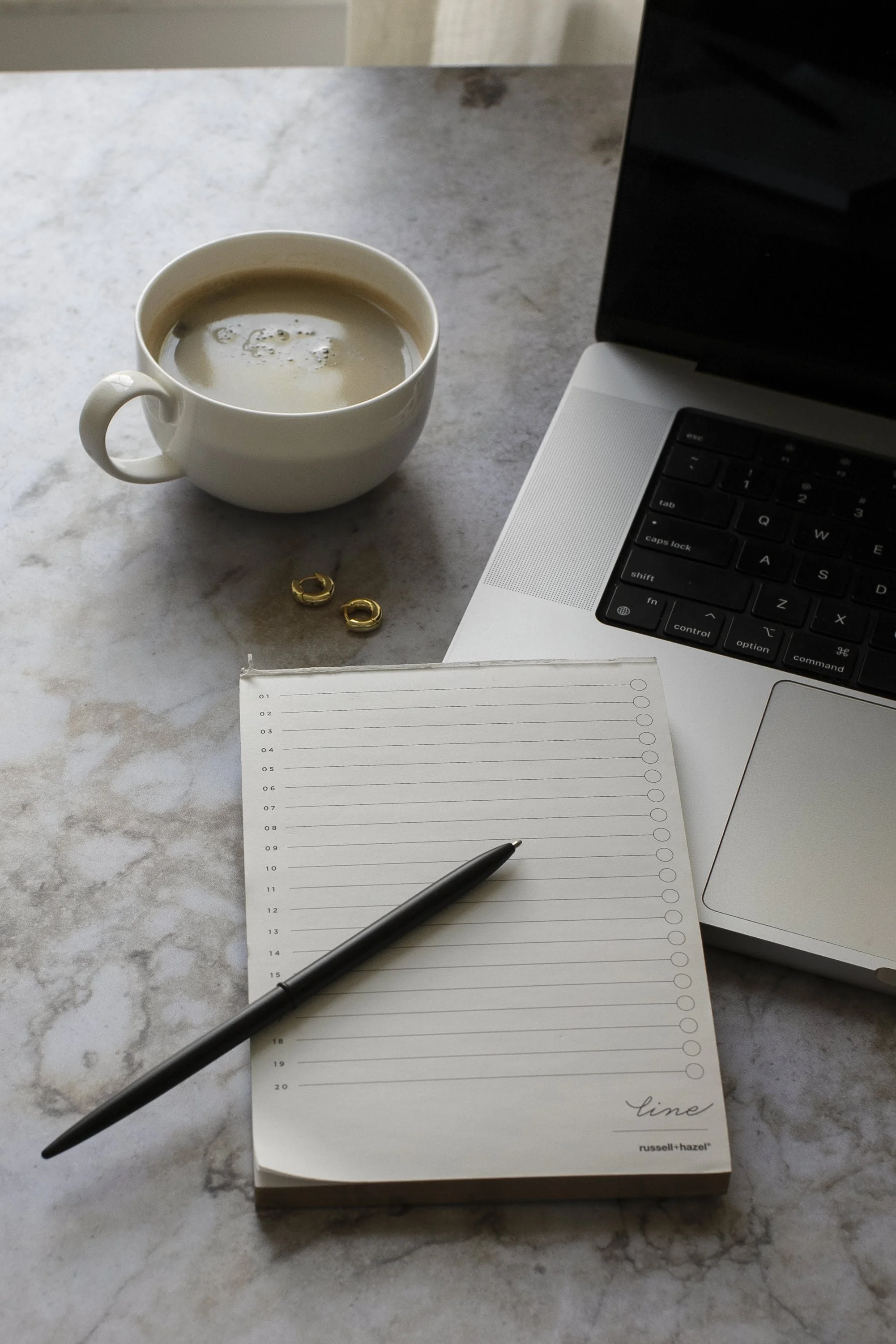 laptop, to-do list and a coffee