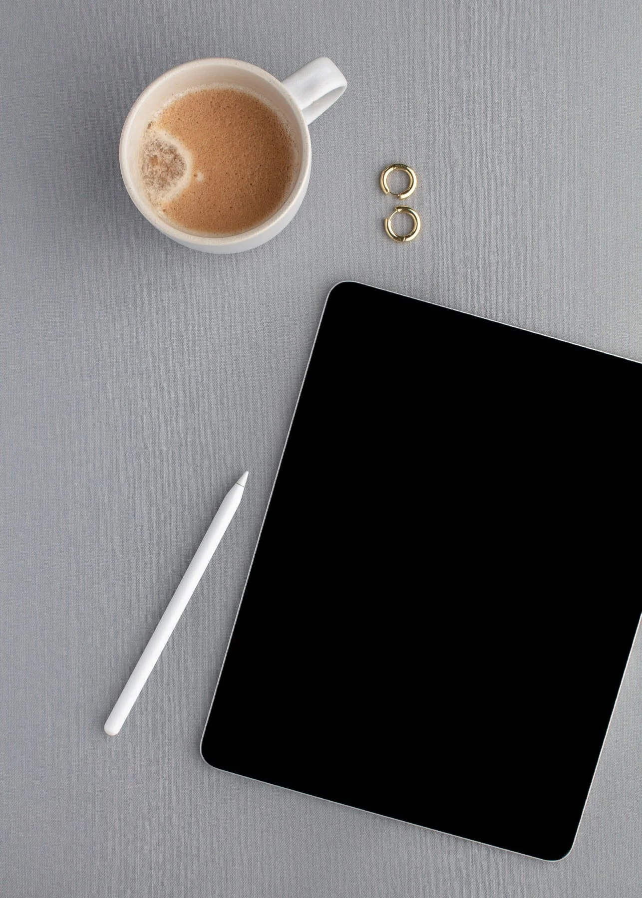 Ipad and coffee on table .jpg