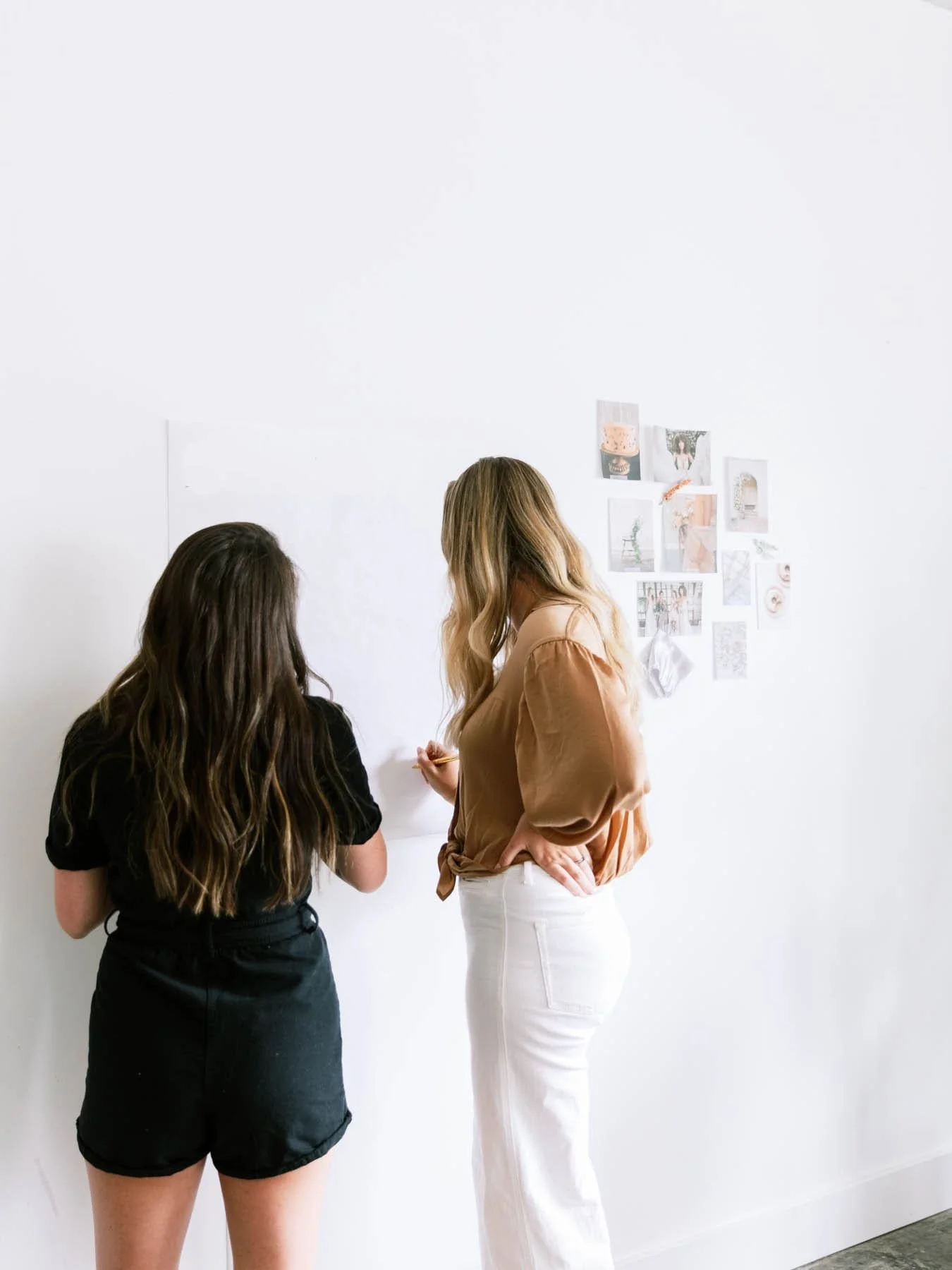designer working on mood board with client .jpg