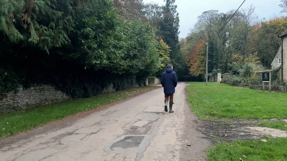 Man walking around the cotswalds.jpg