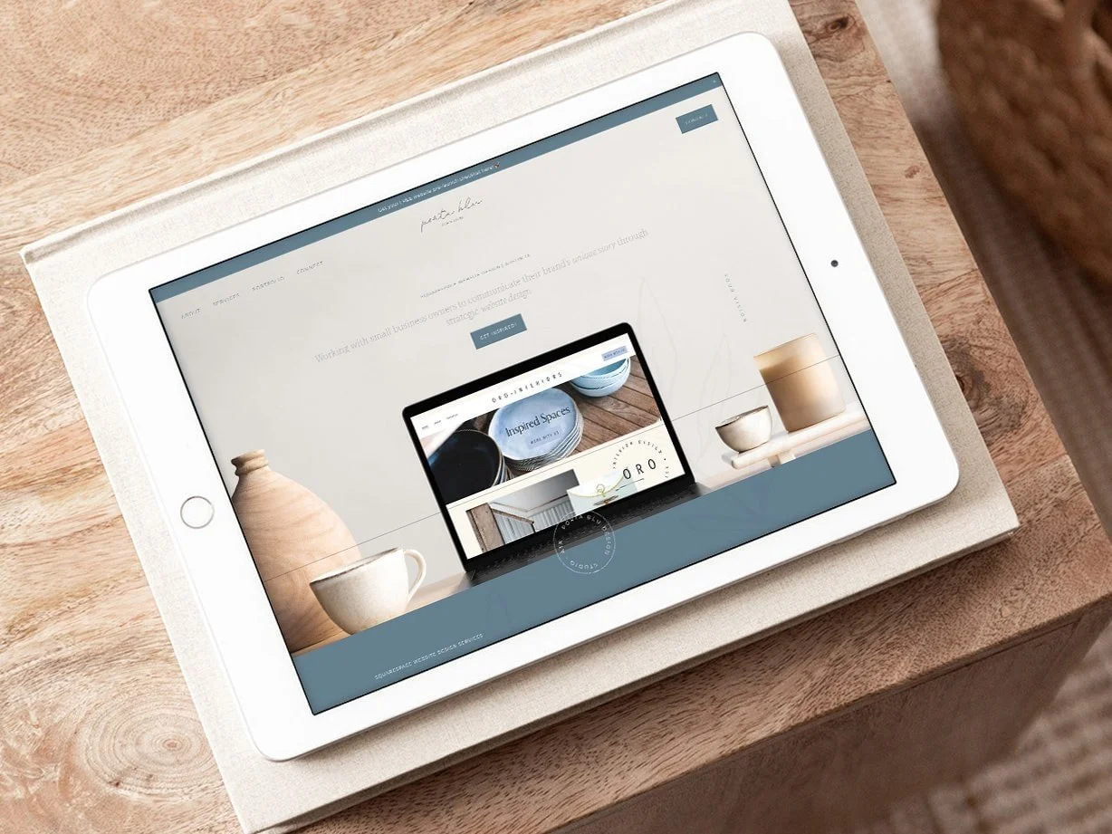 Blue design website on ipad sitting on table