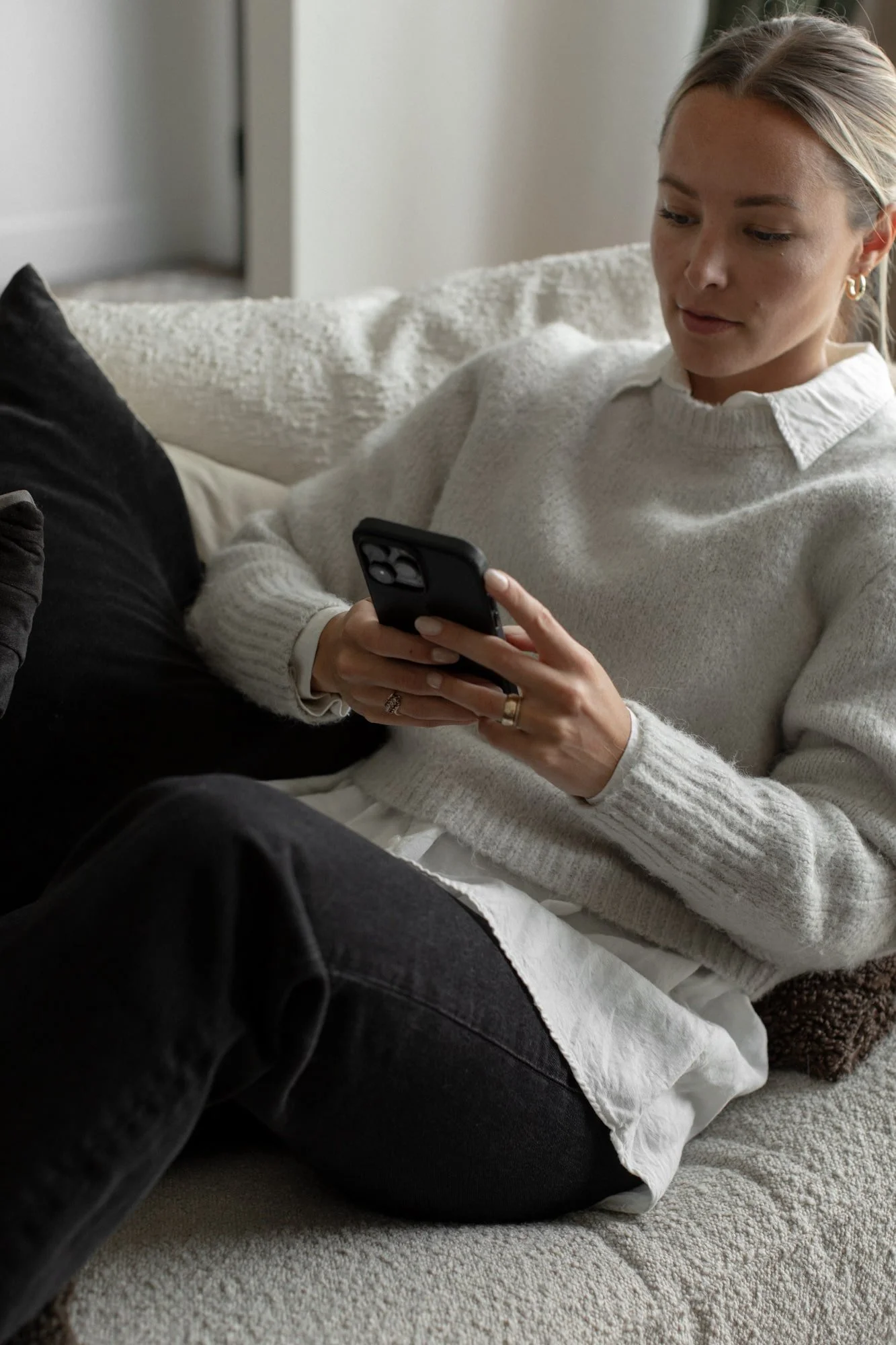 woman posting on instagram on phone