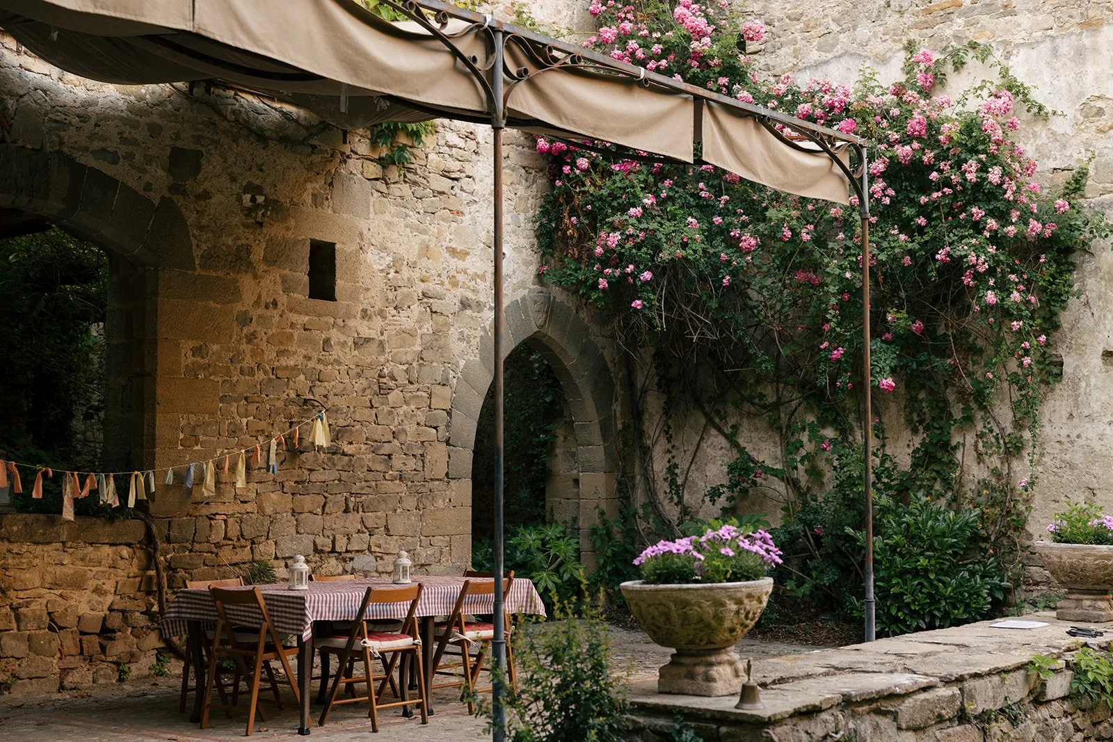 Under a cloister awning.