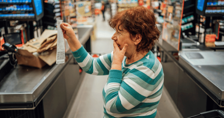 Customer shocked at her grocery bill.png