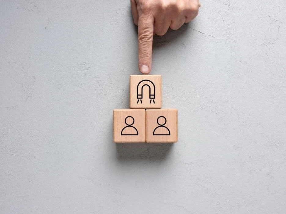 A magnet pulls customers