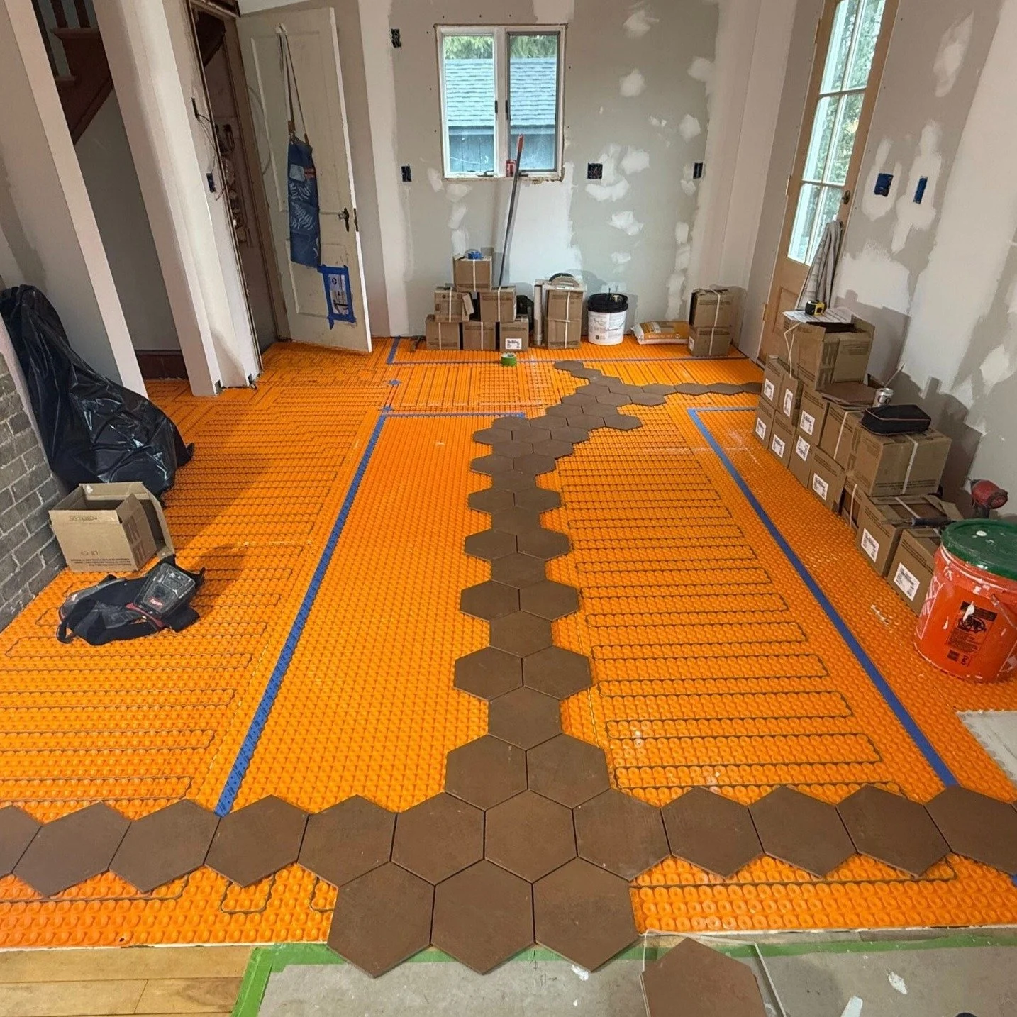 Last week's post, I mentioned the floor...

Stay tuned... Farm sink.. Island placement... Banquette