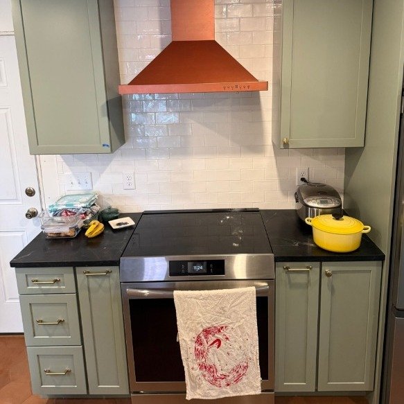 SoPo update ✨

The hood is installed and we&rsquo;re loving the warmth of the copper against the green cabinetry &mdash; one of those combinations that feels both timeless and bold at the same time.

The butcher block island top is now in place, brin