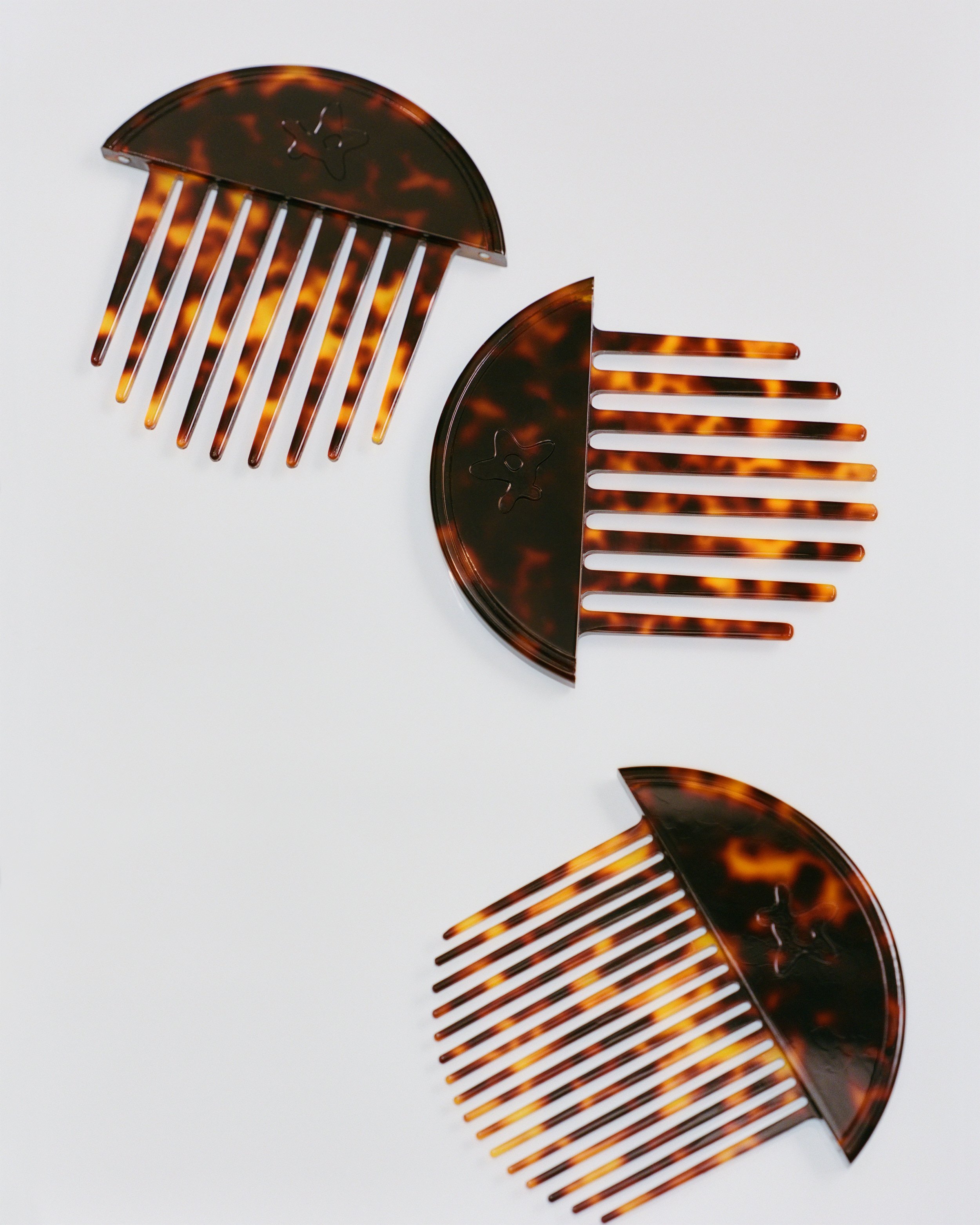 Introducing Orbit. 

Orbit transforms a functional object into a meaningful daily ritual. Recognising that no single tool fits all, Orbit launches in three variations: afro, wide-tooth and fine-
tooth.

@forestalgia 
@emmanuellawal