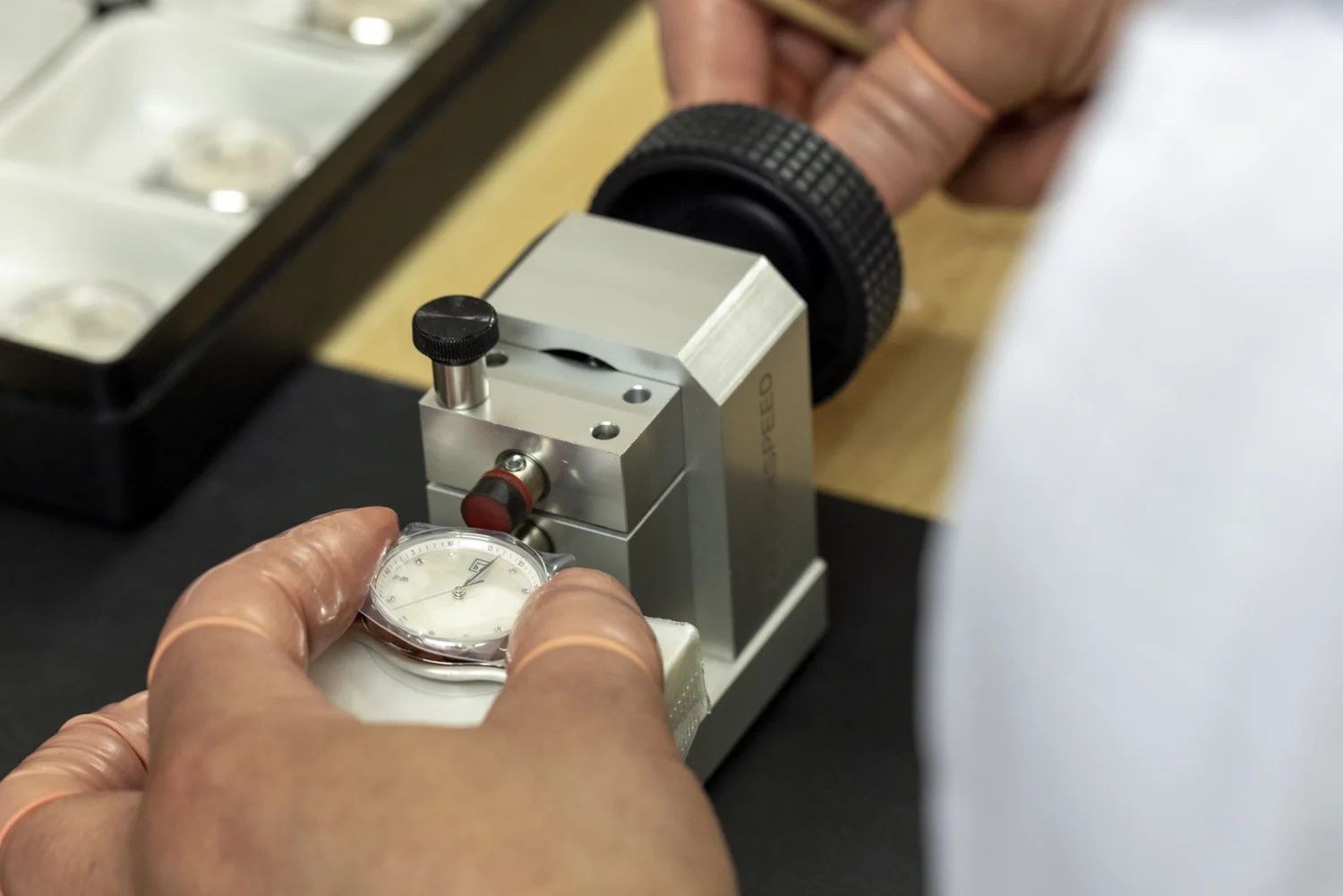 Movement regulation and rate testing on a Swiss watch