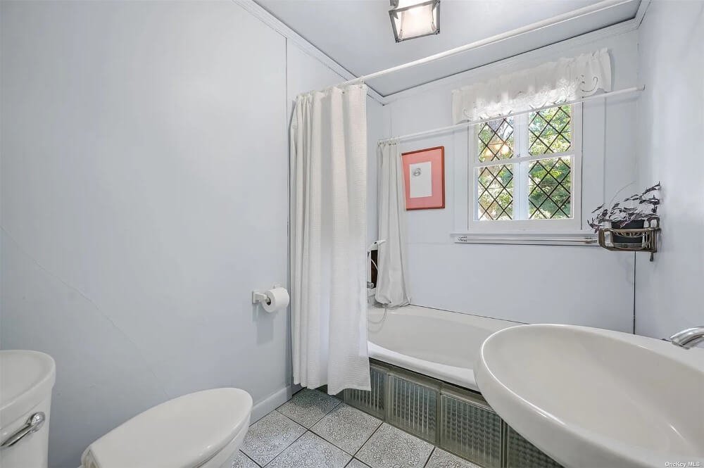 1904 Tudor house Belle Terre New York - third bathroom.jpeg