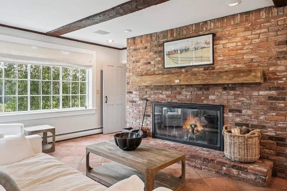 Uplands 1880 Farmhouse Weston Vermont - 10 - fireplace.jpg