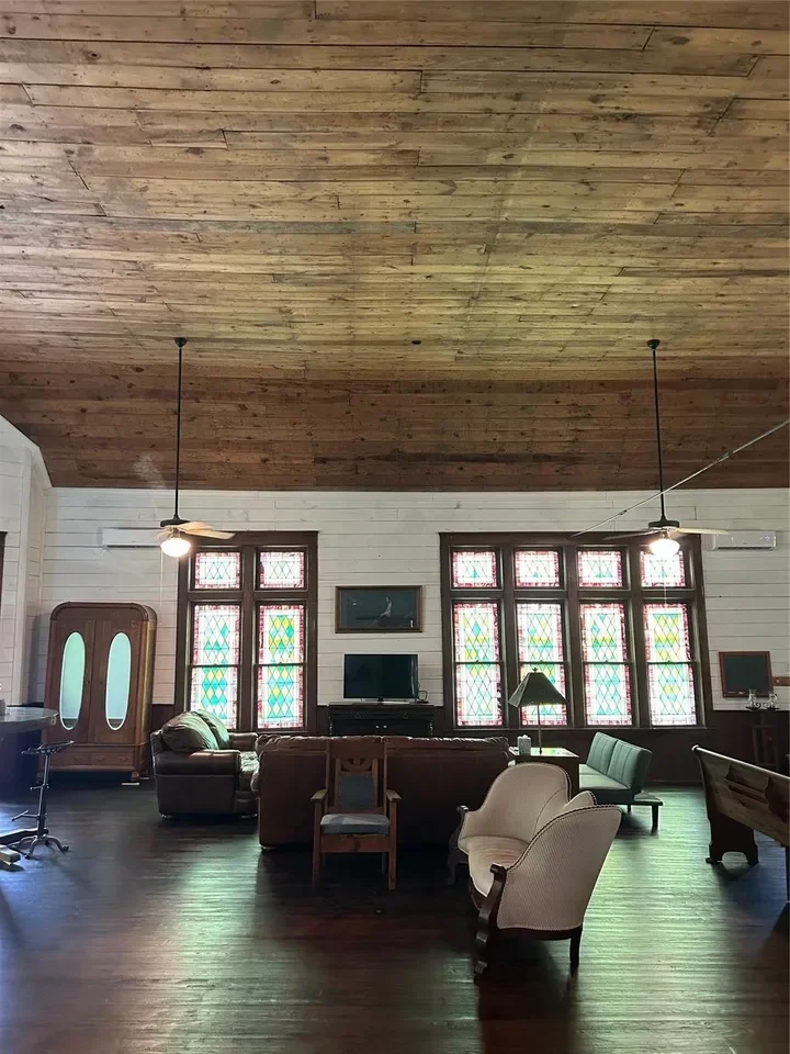 1912 Church converted to home Thornton Texas - 6 - open room.webp