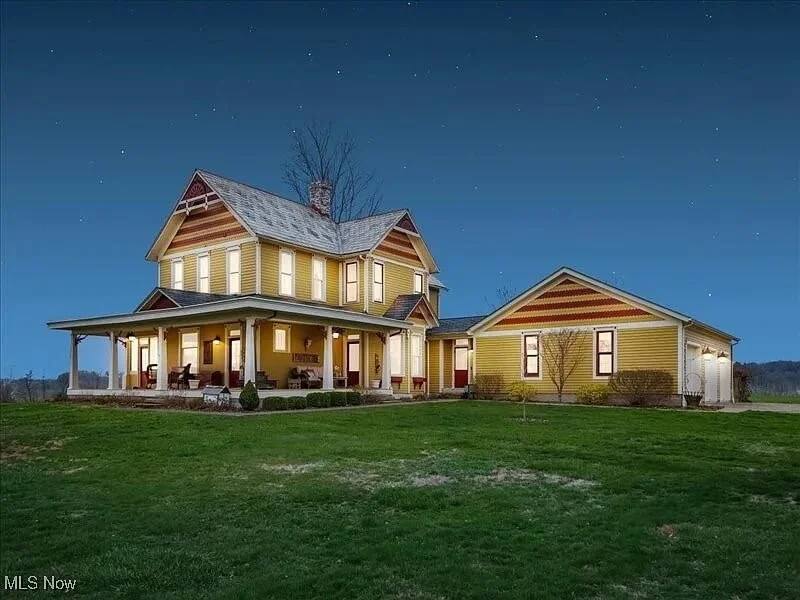 1864 Victorian Farmhouse Cambridge Ohio - 6 - side view night.jpg