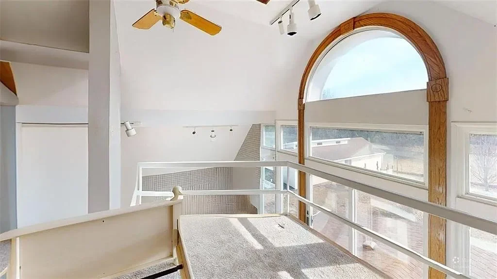 1920 Farmhouse Nevada Missouri - 19 - sunroom.webp