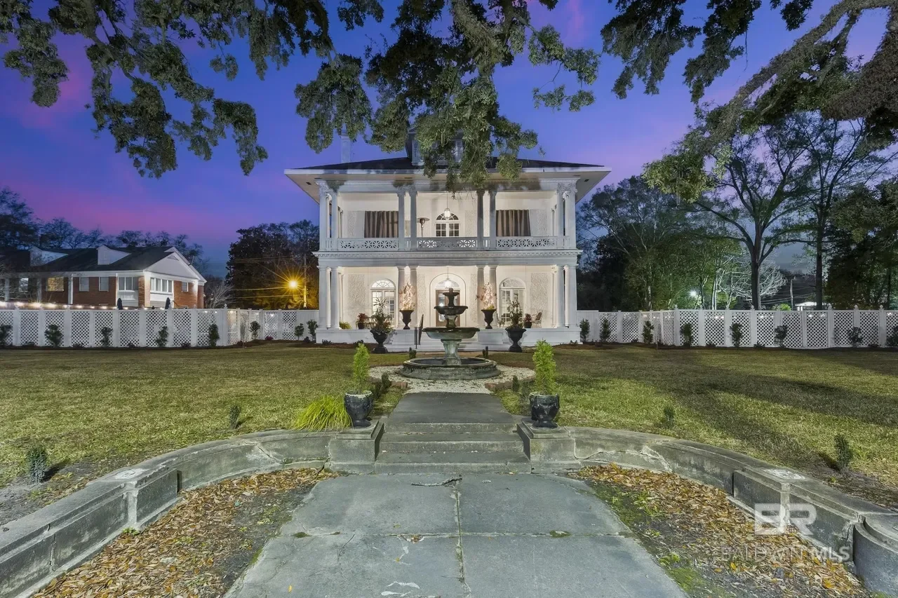 The Inge House known as The Driskell 1911 Mediterranean Revival Mobile Alabama - 2 - front view night.webp