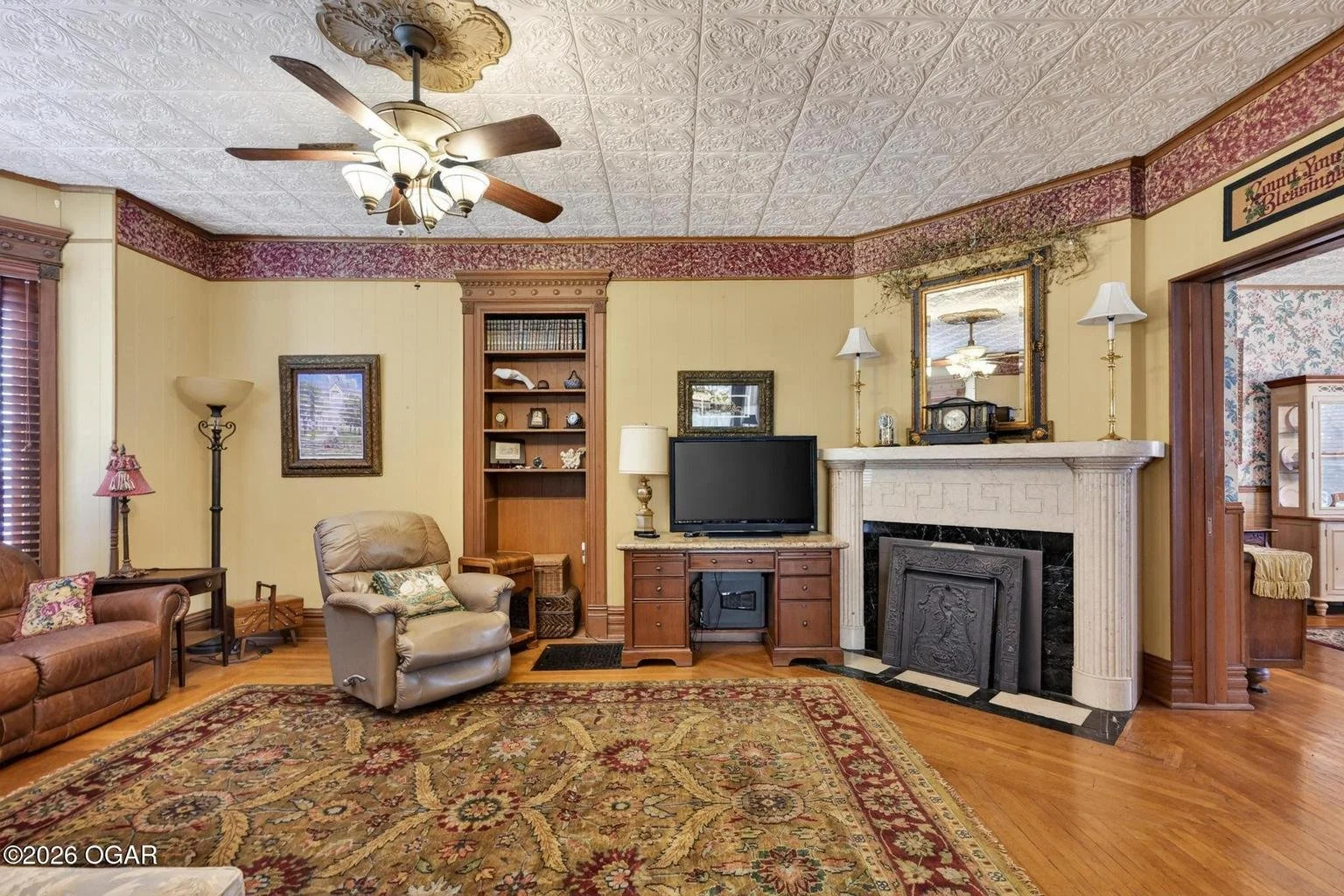 The Irwin House 1897 Queen Anne Carthage Missouri - 17 - family room.jpg