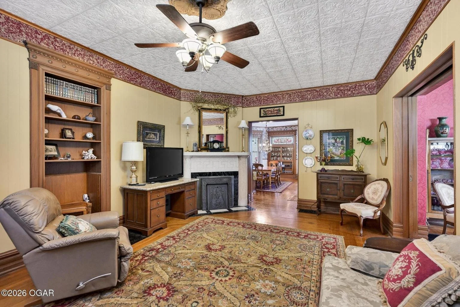 The Irwin House 1897 Queen Anne Carthage Missouri - 19 - family room.jpg