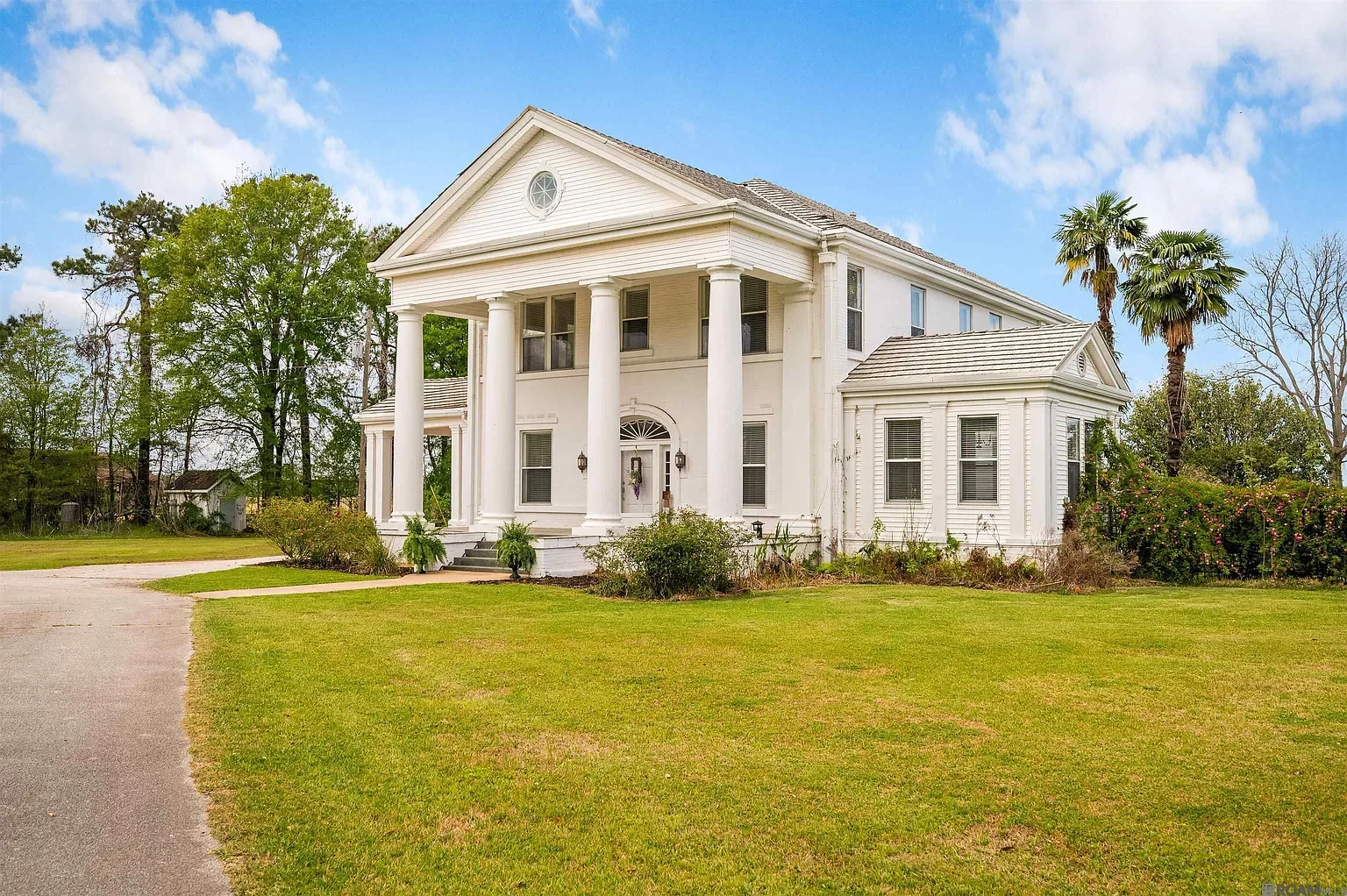 The Wade H Jones Sr home 1913 Colonial Revival Lecompte Louisiana - 2 - front view.webp