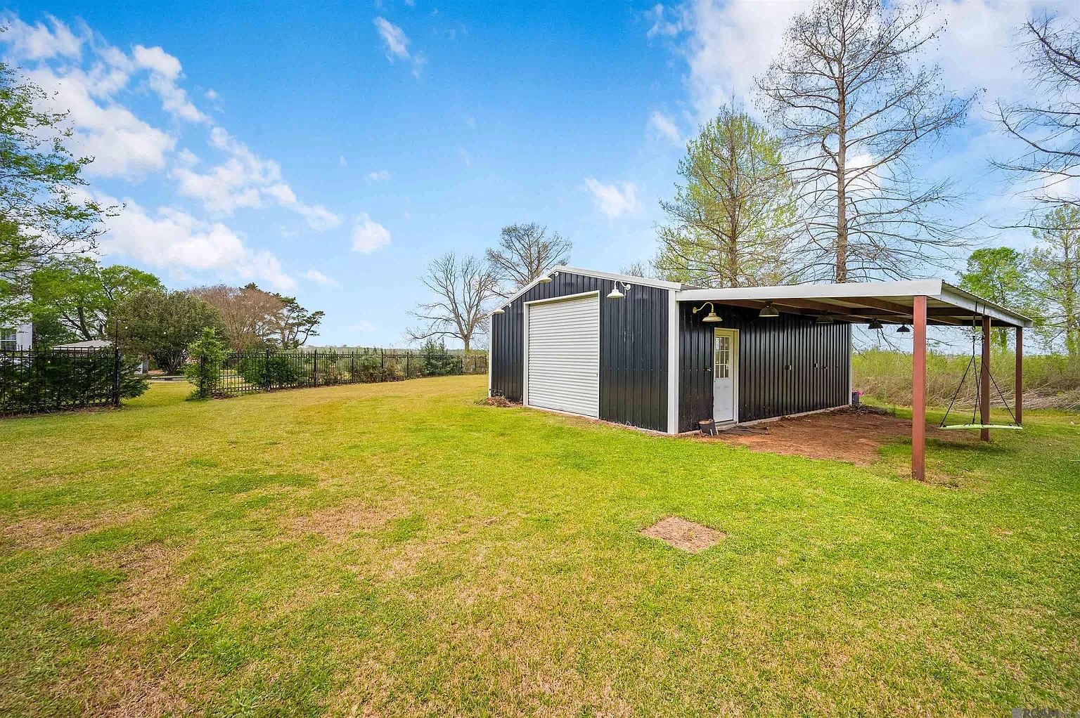 The Wade H Jones Sr home 1913 Colonial Revival Lecompte Louisiana - 34 - barn.webp