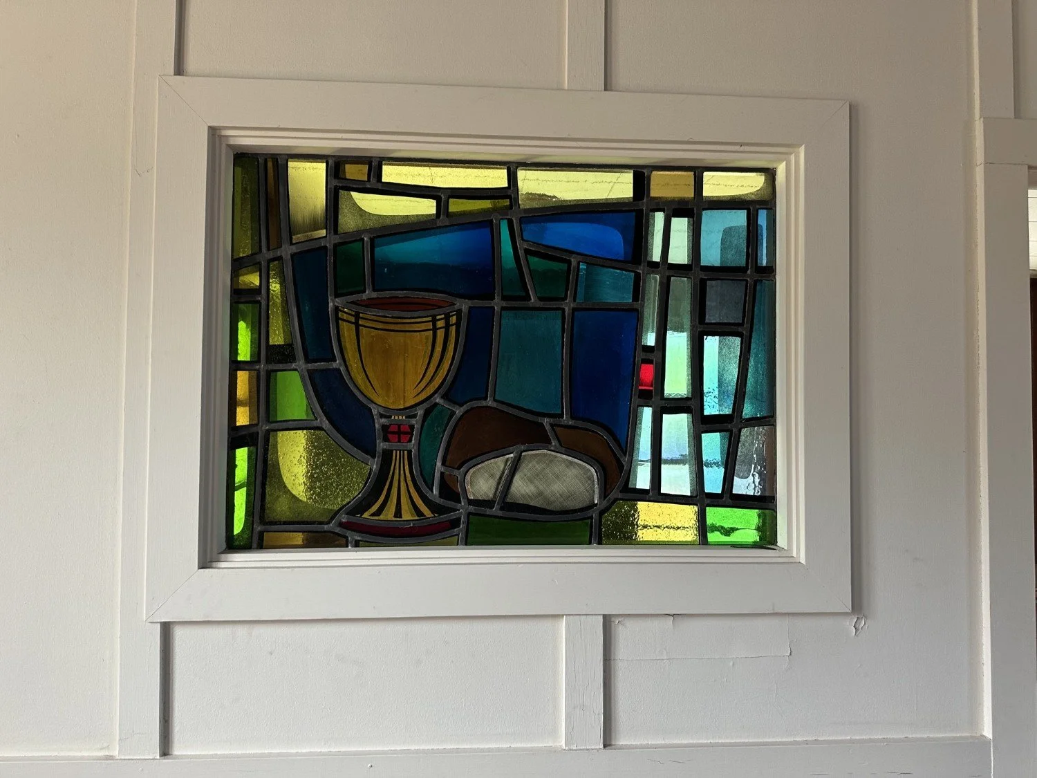 20 Stained glass made by a parishioner.jpeg