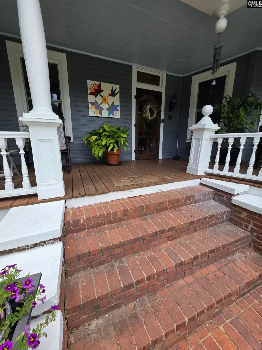 The Peter Oliver House 1904 Victorian Swansea South Carolina - 4 - front porch.webp