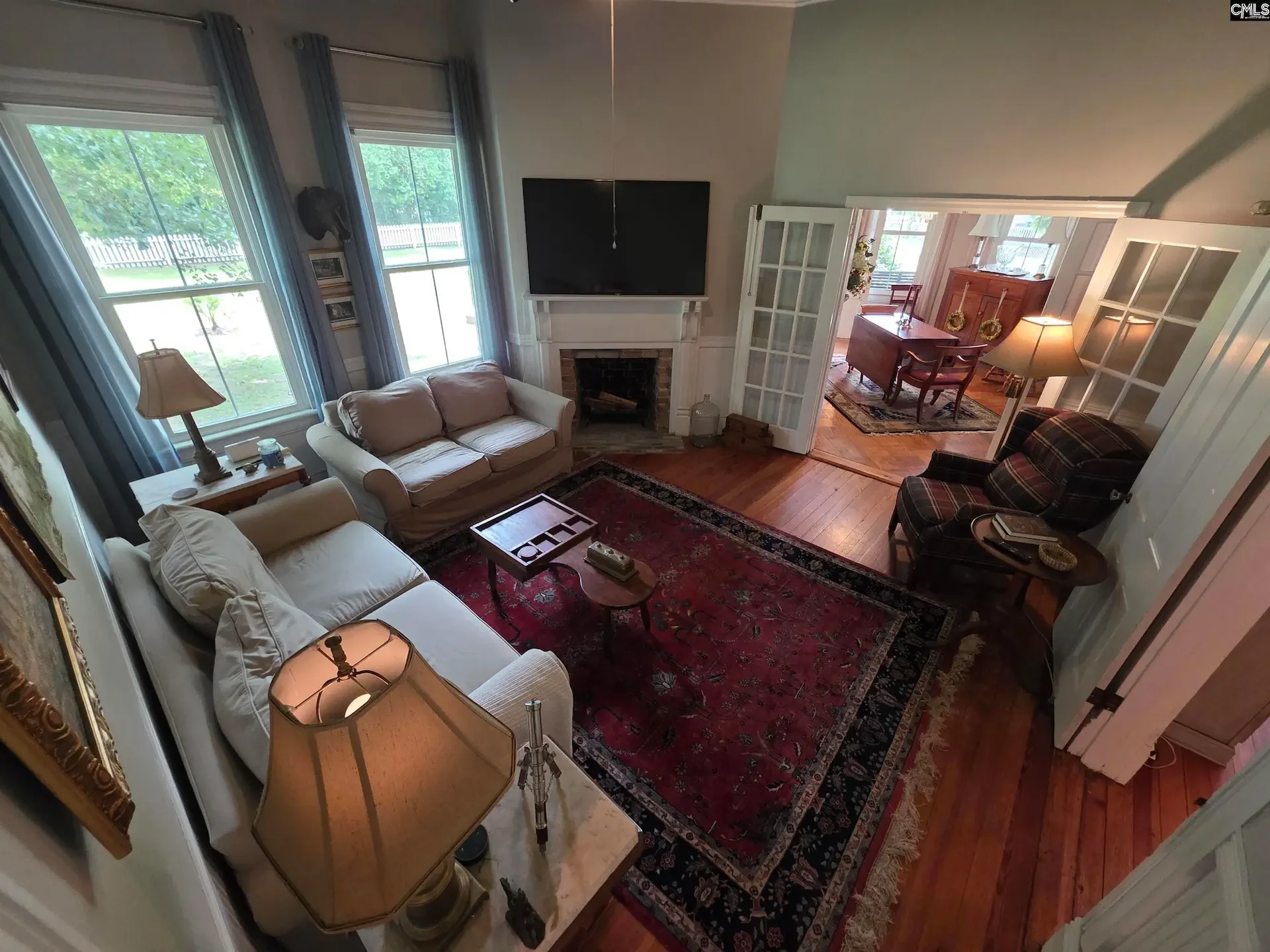 The Peter Oliver House 1904 Victorian Swansea South Carolina - 13 - family room.webp