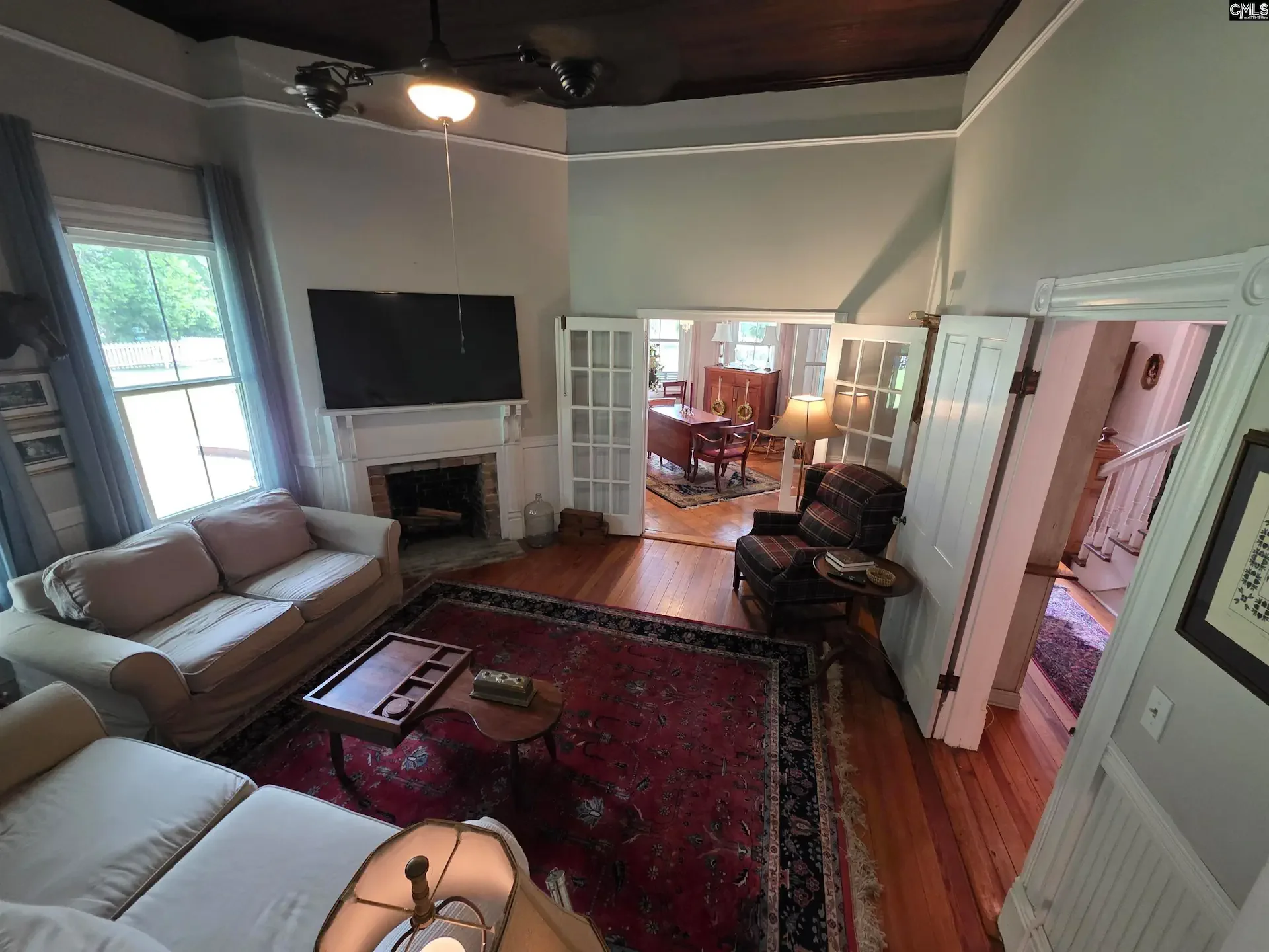 The Peter Oliver House 1904 Victorian Swansea South Carolina - 15 - family room.webp