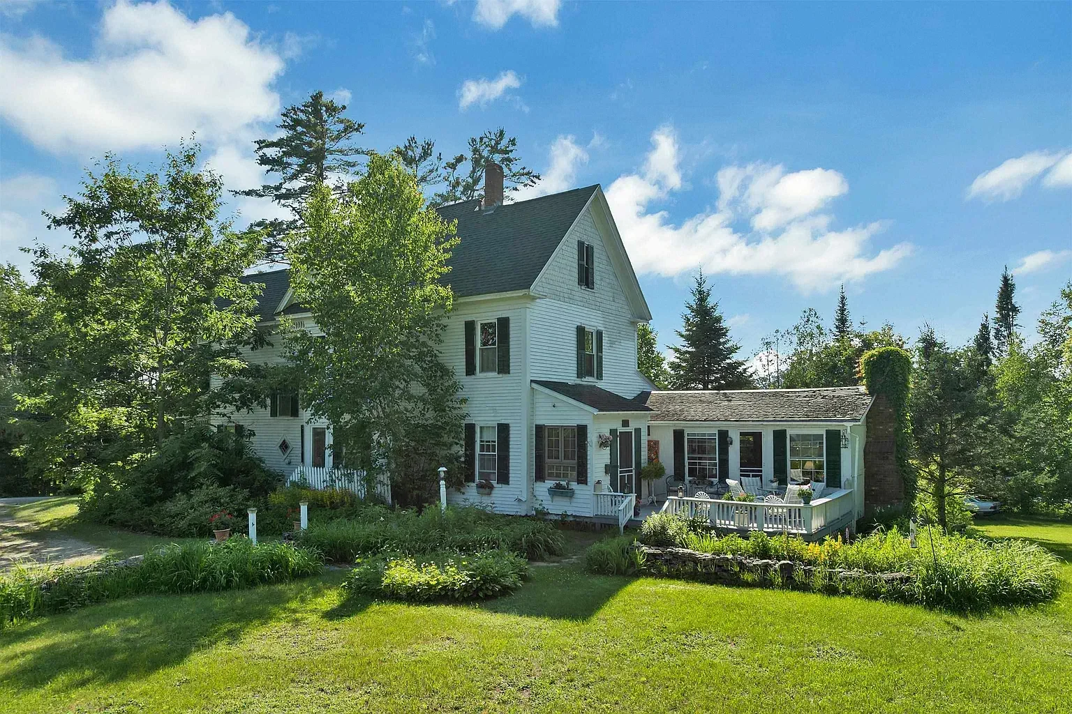 1892 Victorian house Whitefield New Hampshire - 4 - back view.webp