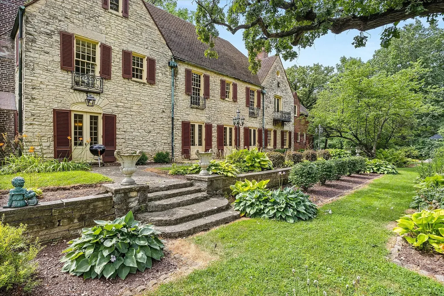 1930 Tudor Revival house Peru Illinois - 7 - back view.webp