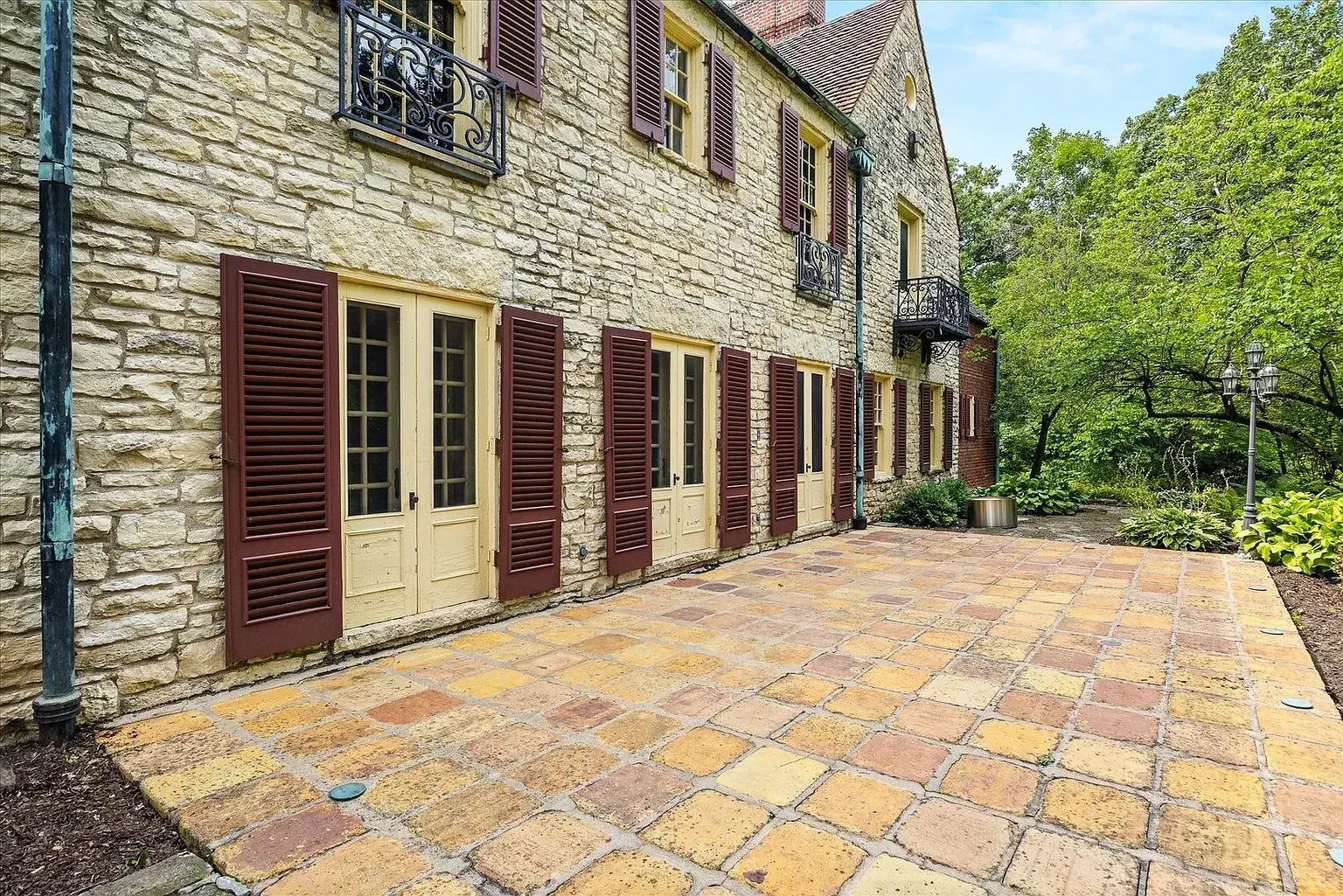 1930 Tudor Revival house Peru Illinois - 9 - back view.webp