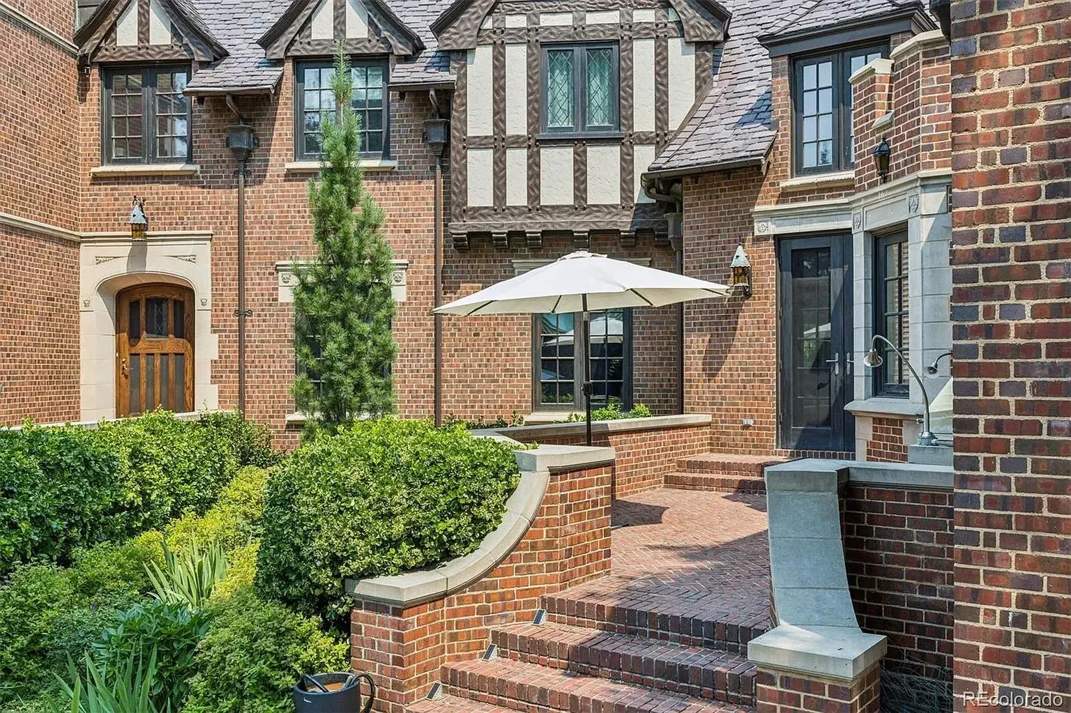 1931 Tudor Revival house Denver Colorado - 44 - side view.webp