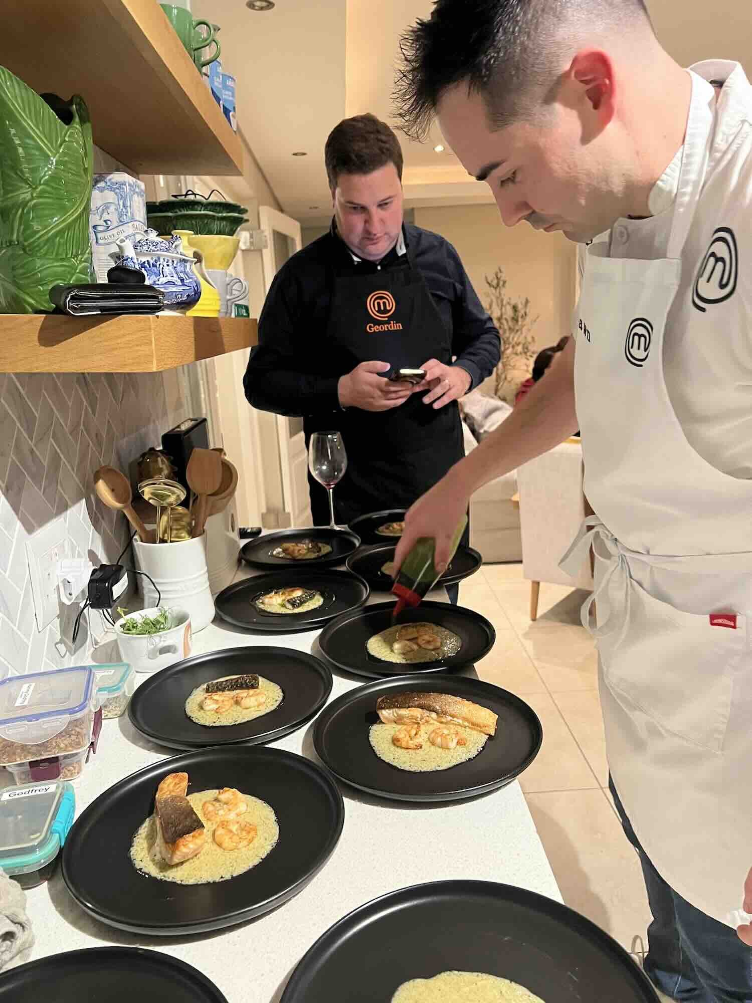Finishing off the dish with a basil oil drizzle