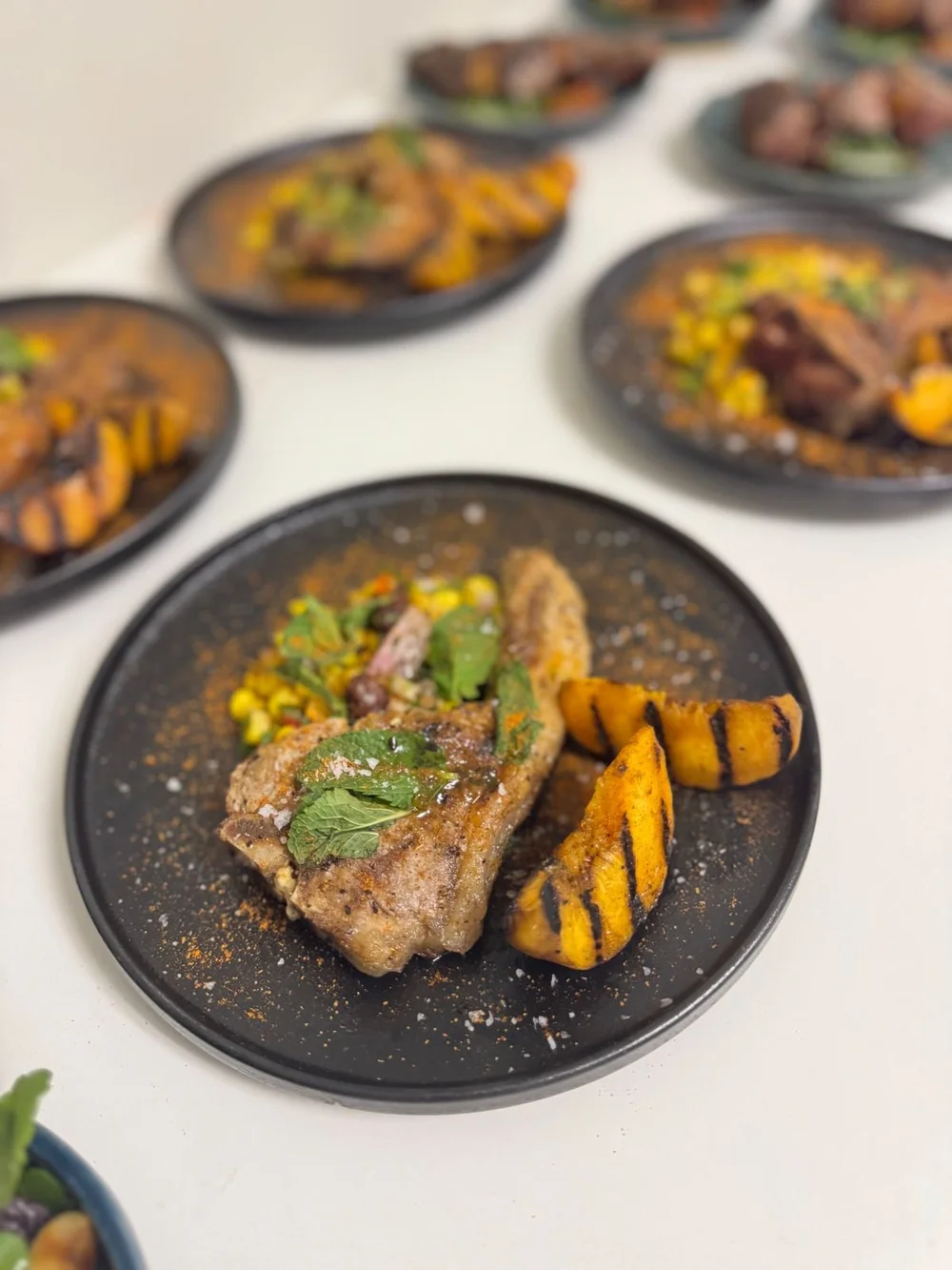 Lamb loin chops grilled with a delicious mint and grilled peach salsa.jpeg