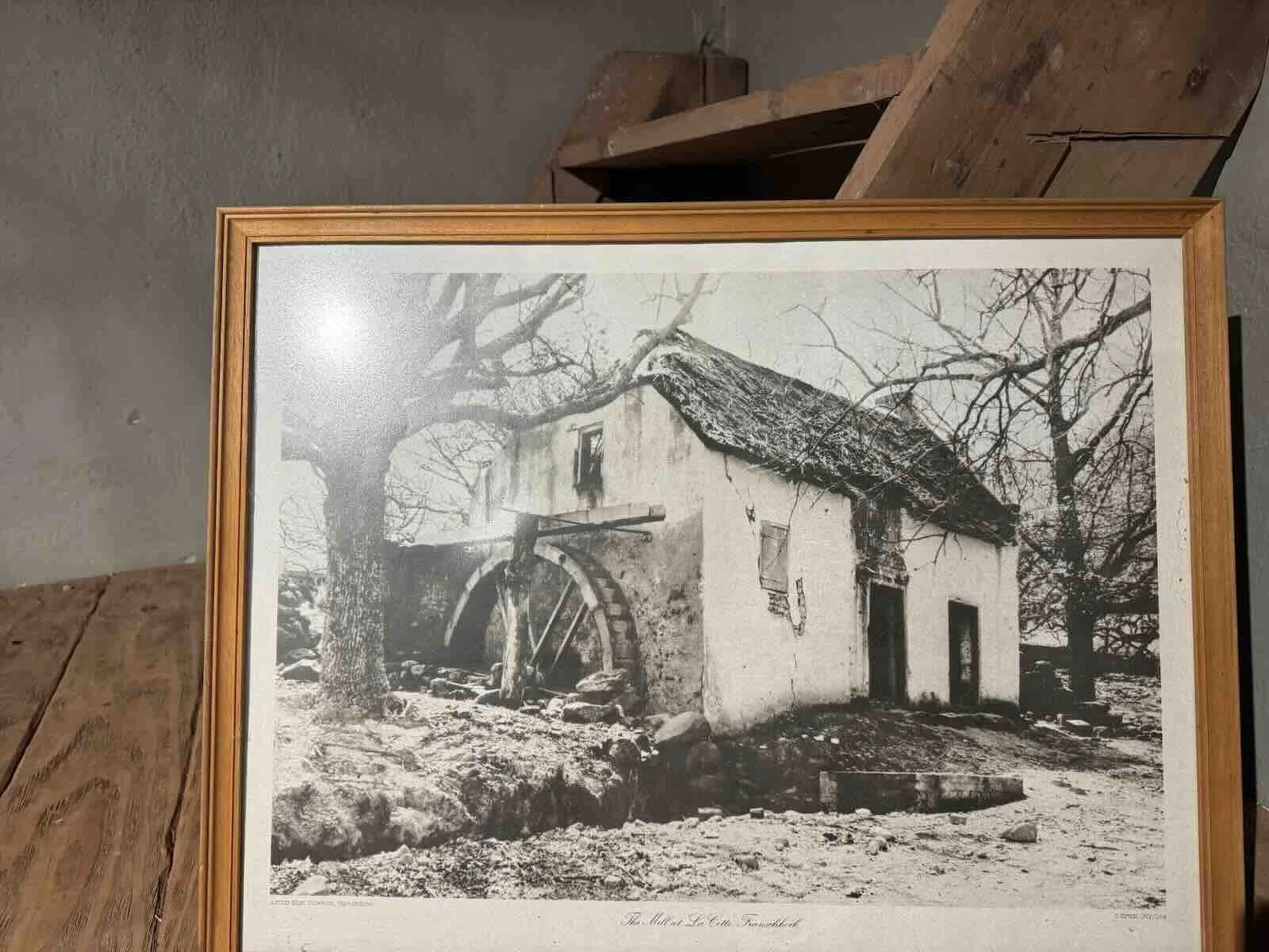 An old photo is on display at the Mill House La Cotte Franschhoek showing how the mill house looked before it was restored recently