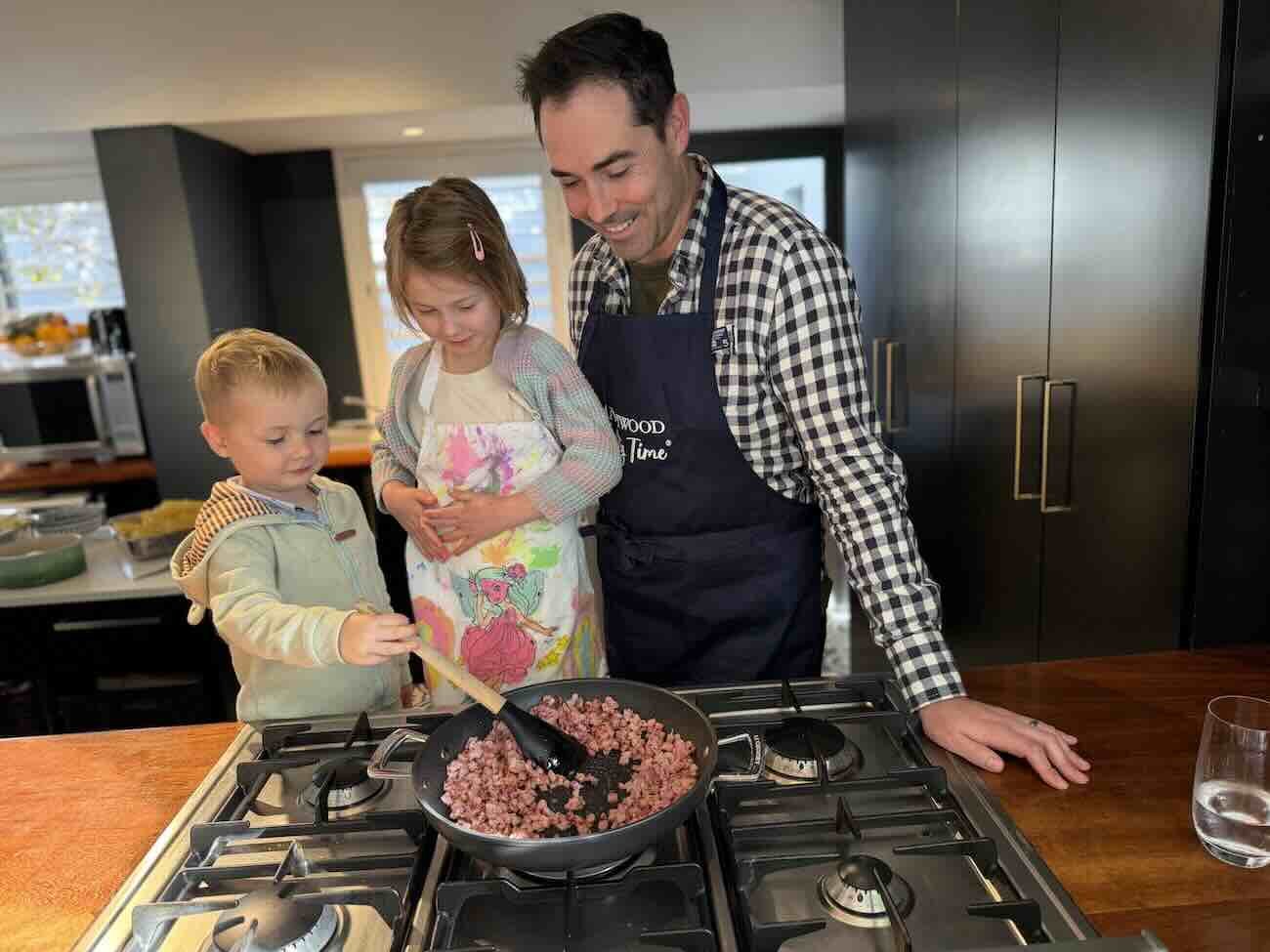 Shawn and kids frying up bacon bits