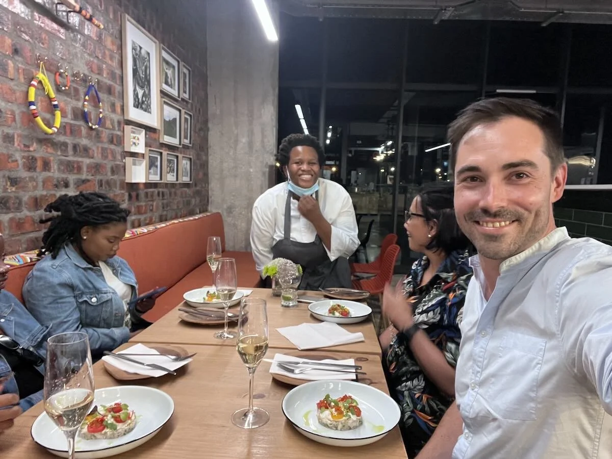 Chef Mmabatho Molefe, the Roasted Dad Shawn Godfrey and guests at Emuzulwini restaurant at Makers Landing.
