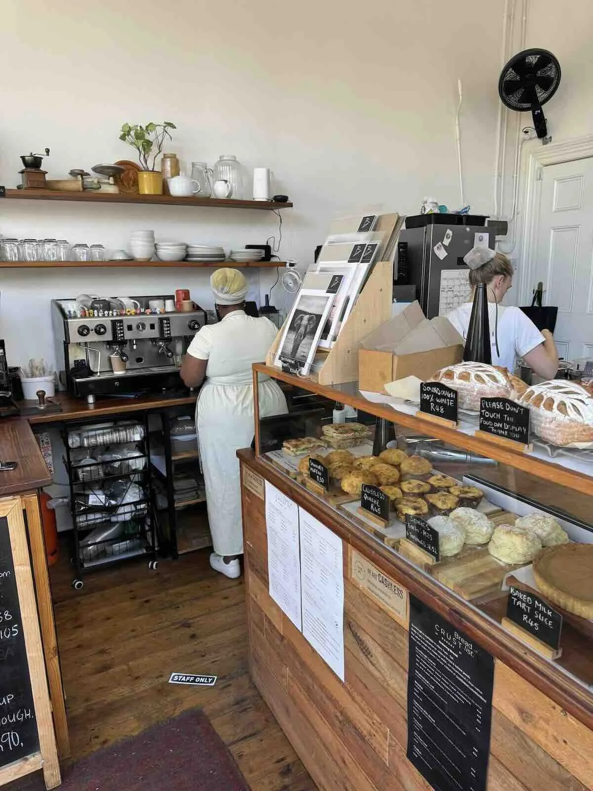 Barista Nokwanda and CRUST bakery owner Jamie Tucker in the kitchen in Rondebosch.