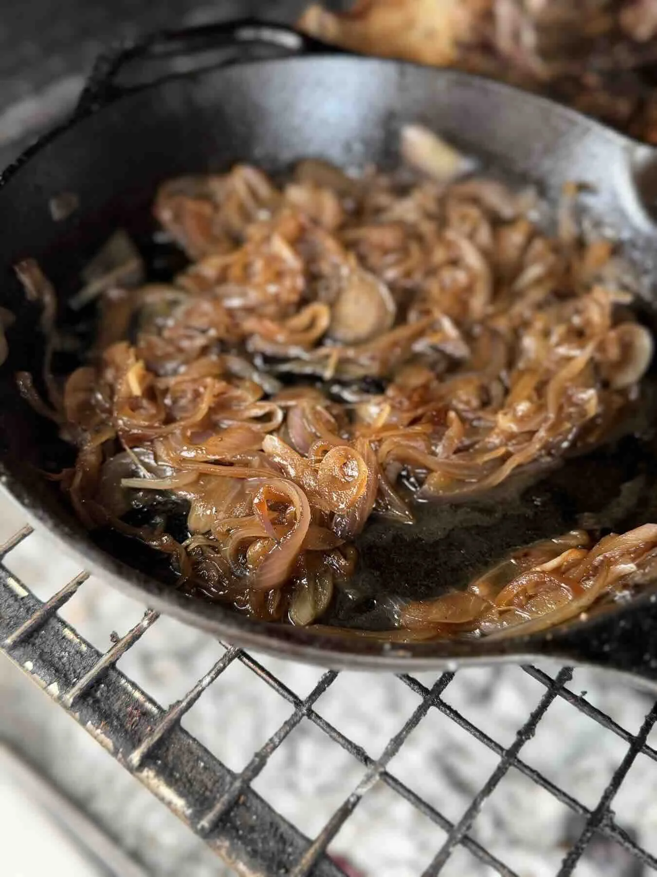 Caramelising onions on the braai