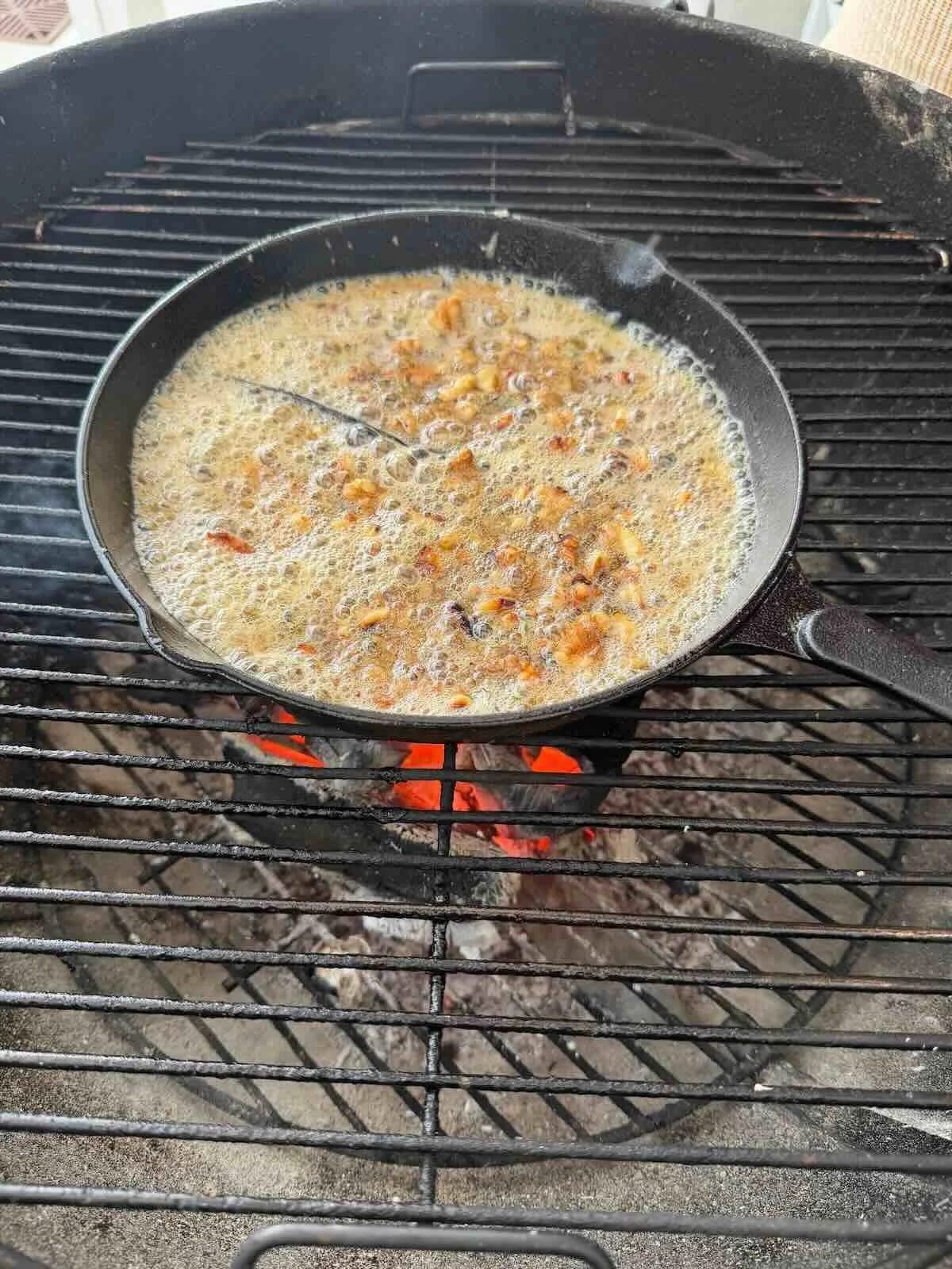 Caremelising butter, thyme, walnuts, vanilla pod and brown sugar on Weber
