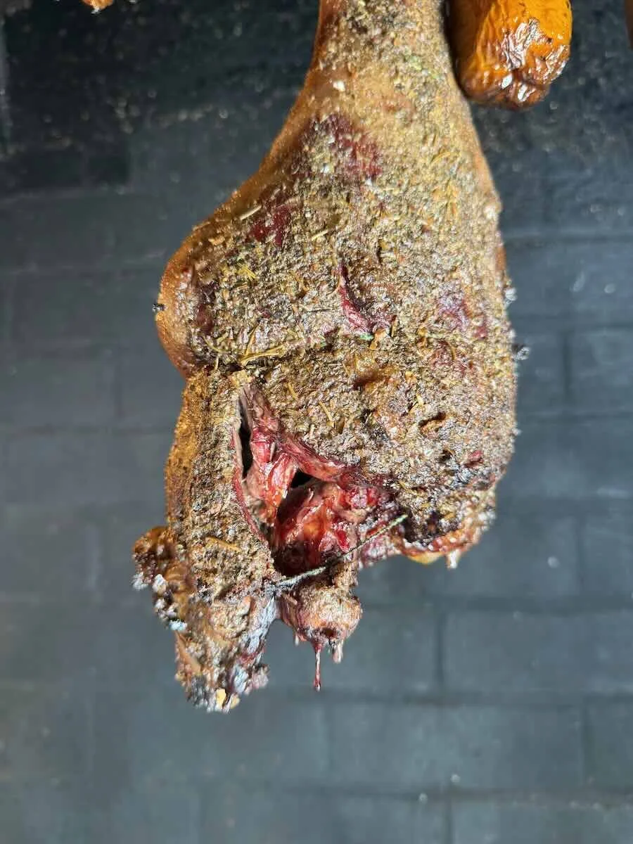 smoking-lamb-meat-hooks-braai-argentinian-style