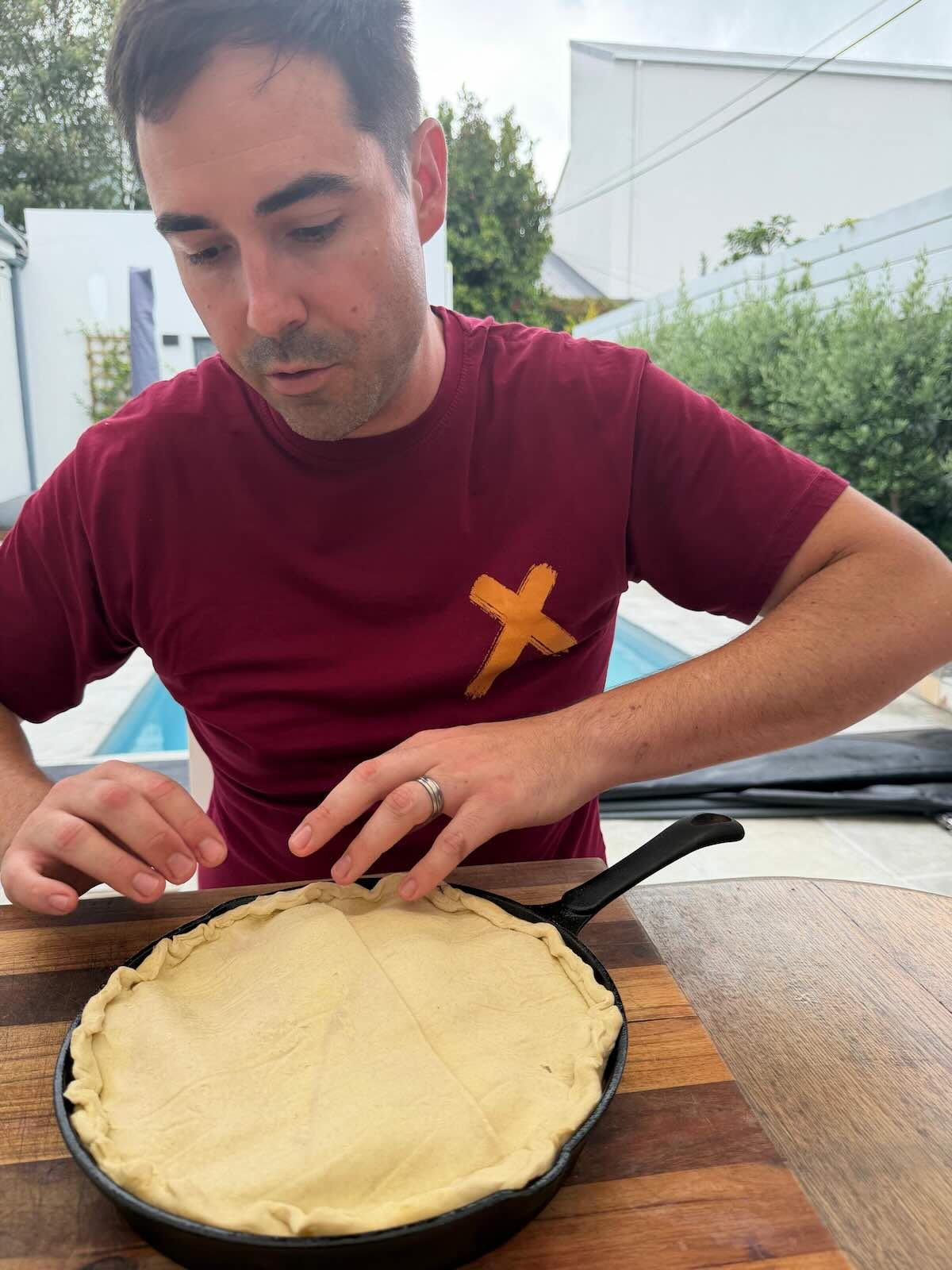 Shawn covering Stone fruit Nectarine Tarte Tatin with puff pastry