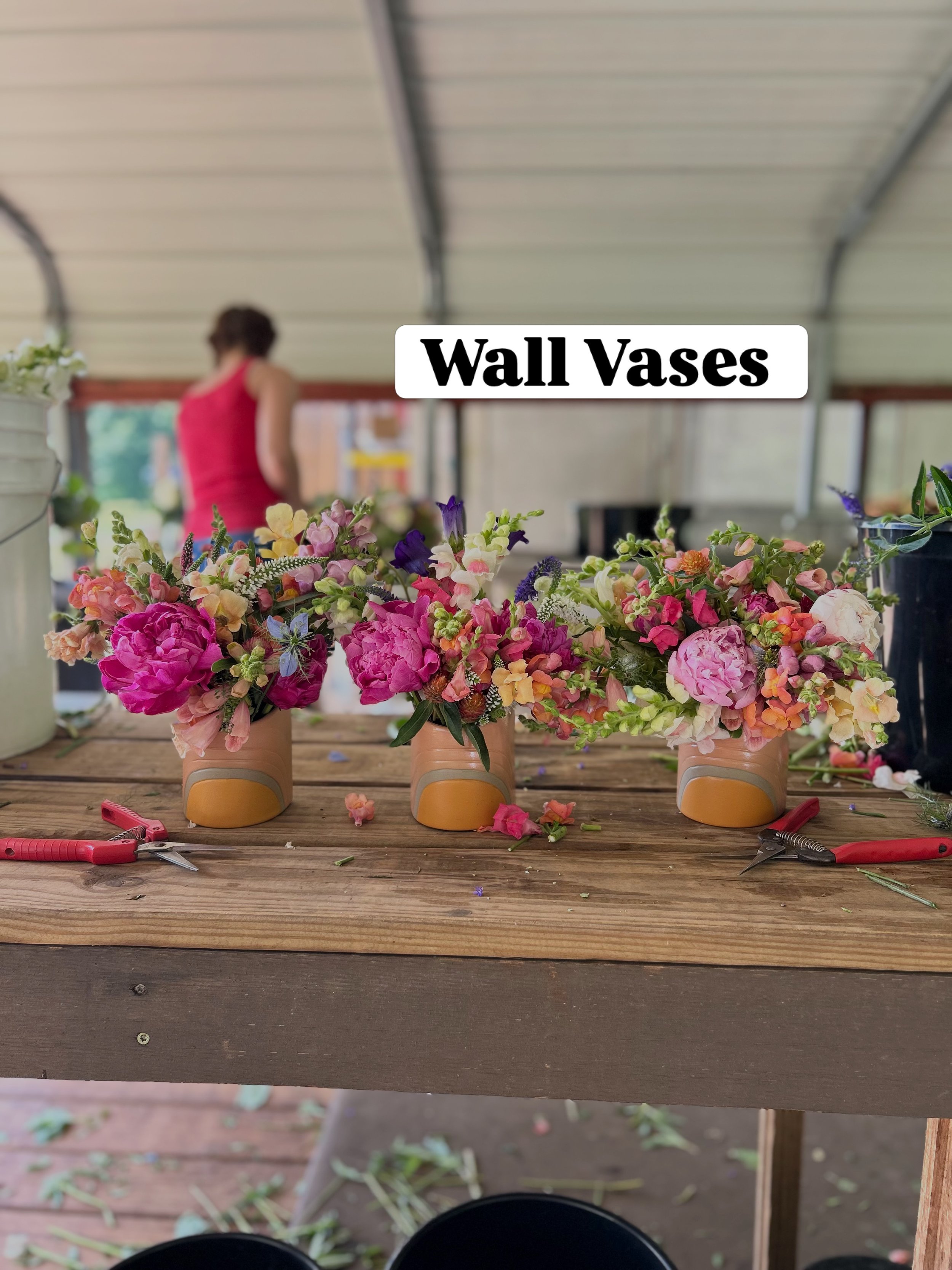 These wall vases are an artful piece where you can place fresh flowers (and dried) throughout the year. 

We are bringing them to the Greenville Saturday Market tomorrow along with lots of fresh bouquets, snapdragons by the stem and more.