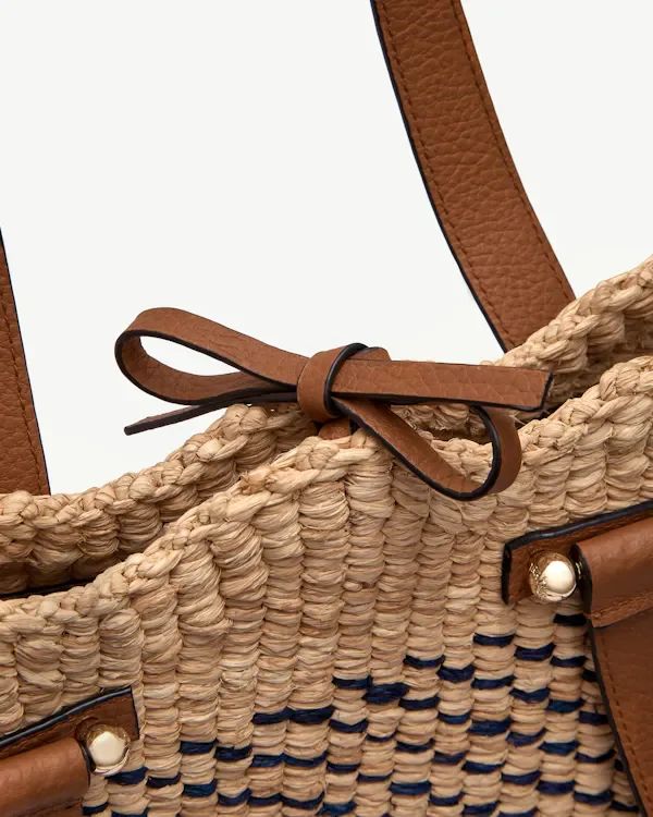 1773328844-scallop-tote-feature-shot-leather-tie-closure.jpg.webp