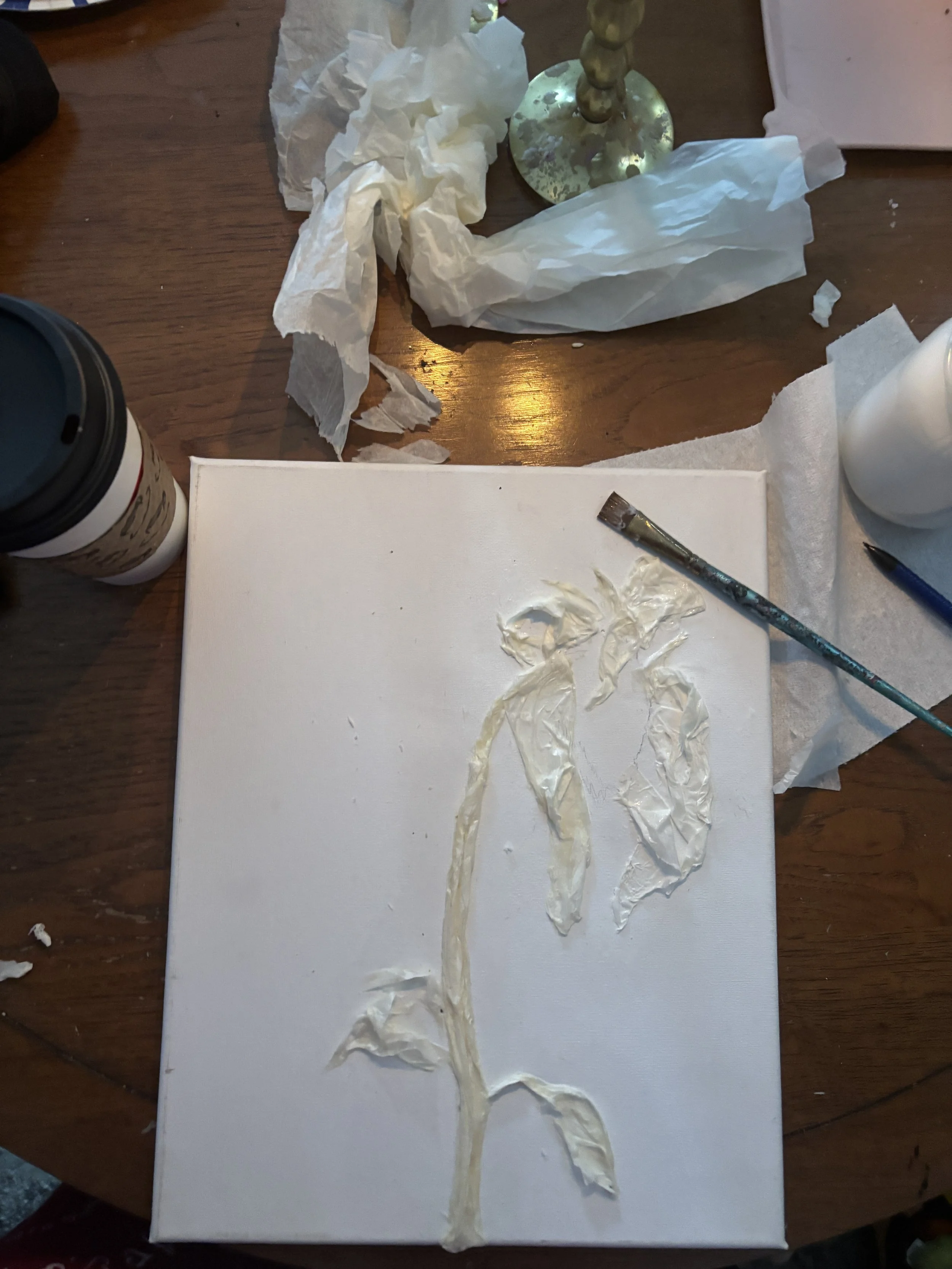 artist studio setup with sunflower paintings in progress