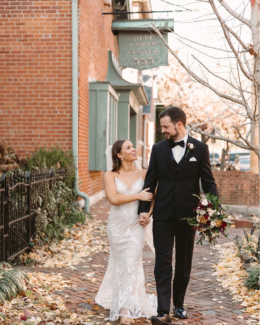 We love that Brewery District charm 🖤🖤🖤 Cobbled streets &amp; gorgeous homes surround our historic venue and we can't get enough of it. 😍

Photography: @brookmadephotography 

Image descriptions:
Image one: A bride and groom walk together on a co