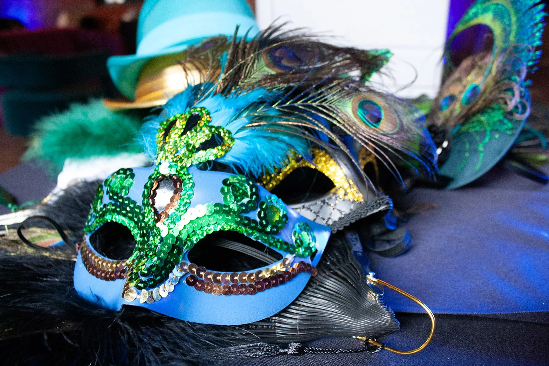 Closeup of a masquerade mask prop for a photo booth at a birthday party event at High Line Car House