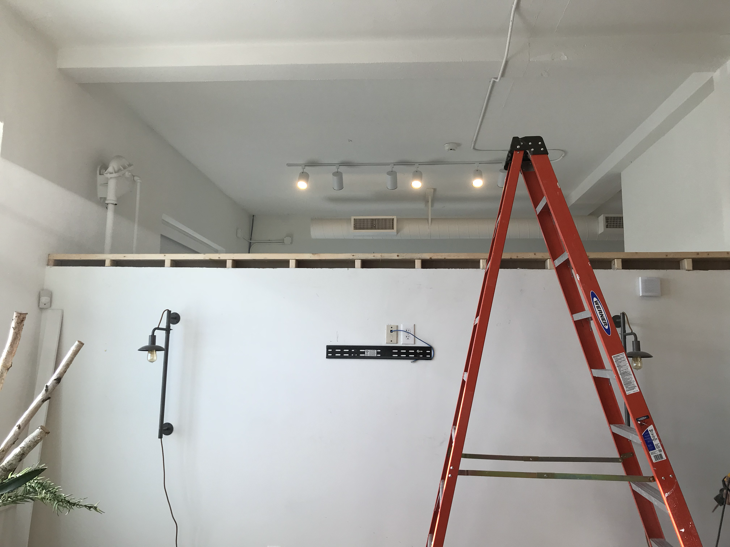 Drywall framing and custom wood work with customized decoration.