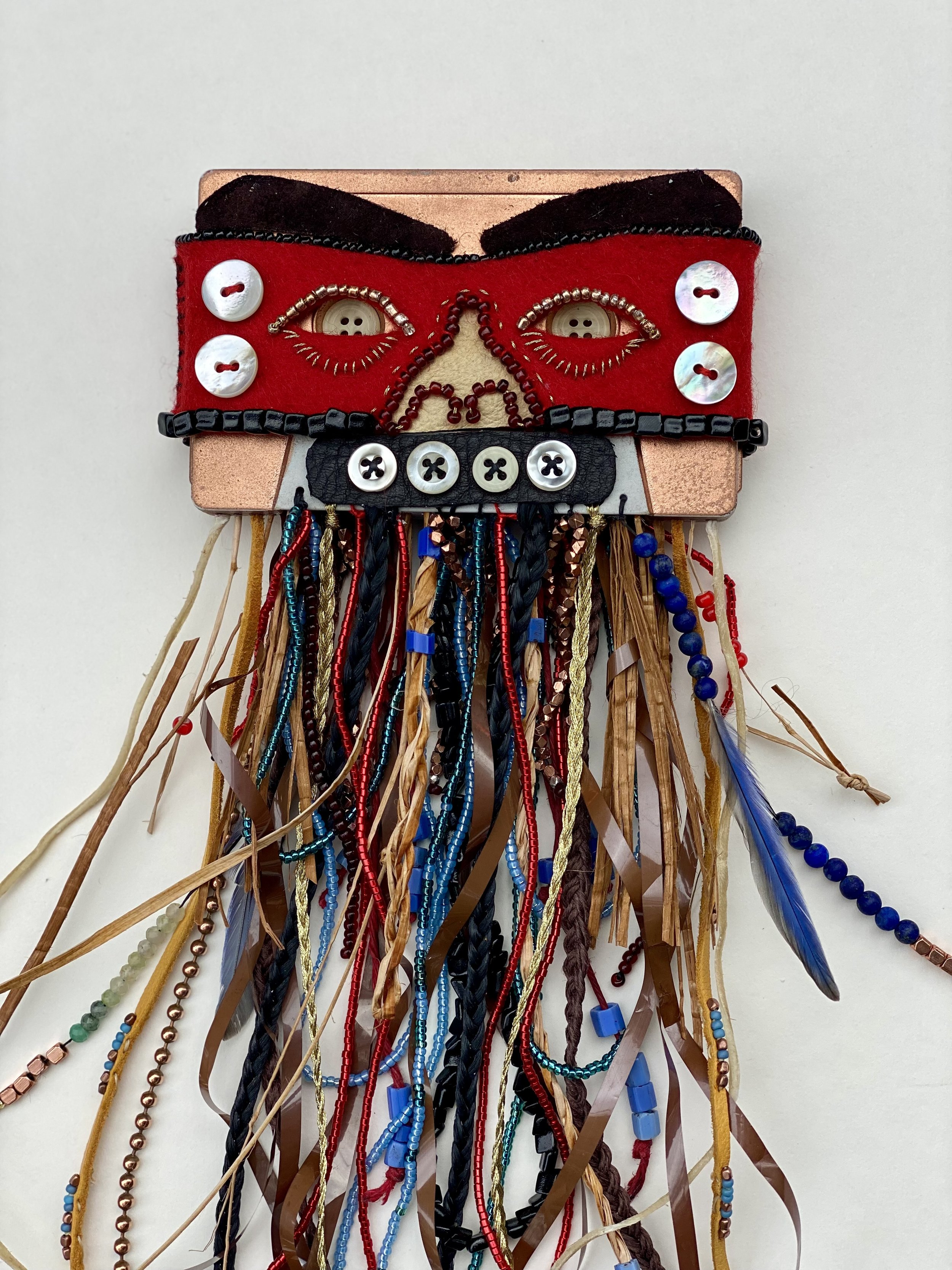 ḵaahláang an unsád, iitl' tláawhla ḵuyaadang (to know what is inside, to love what we are made of), 2024
cassette tape, deer leather, felt, antique buttons, abalone buttons, glass beads, copper beads, red cedar bark, yellow cedar bark, white wat