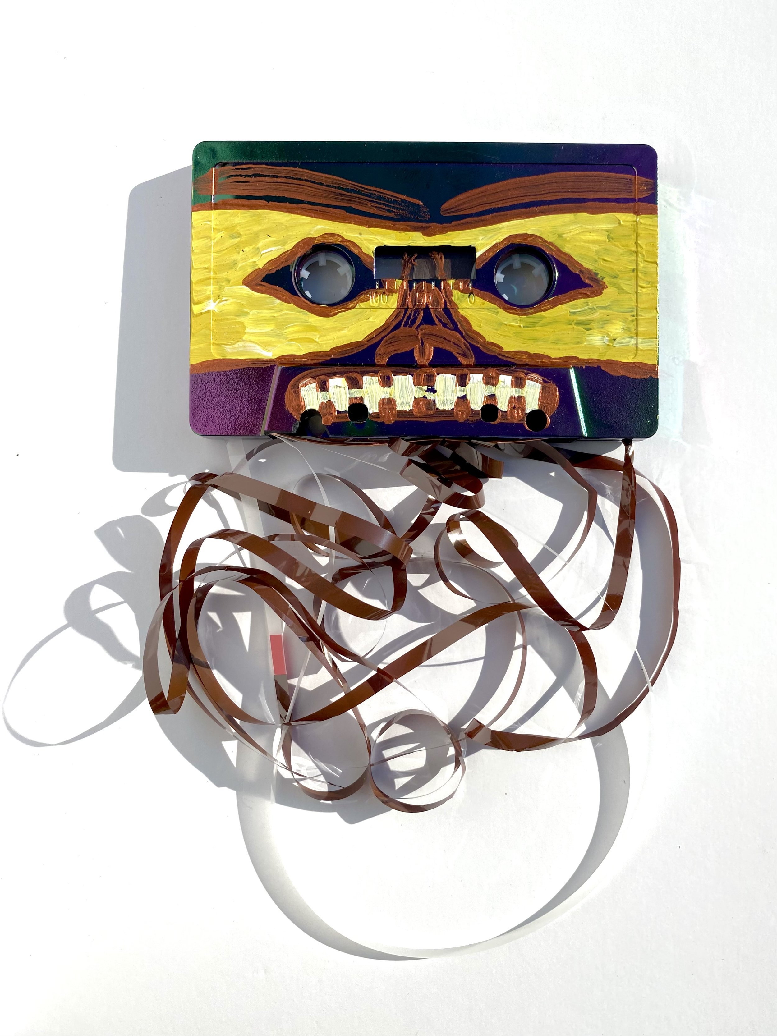 Insecure Mixtape. Whimsical Story. 6. Born With the Sun in Cancer//Self-Portrait (Little Green)
Acrylic on cassette tape 
2 1/2”x4”x1/2” + amorphous tape hanging