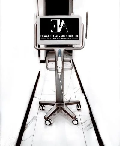 Itero scanner with logo of Edward A Alvarez dds pc on the screen. Invisalign scanner.